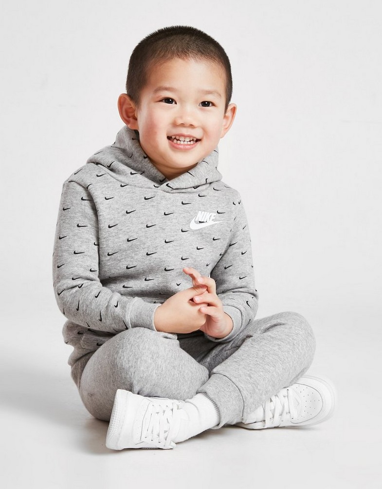 Detská tepláková súprava NIKE DRES ALL OVER PRINT SWOOSH OVERHEAD TRACKS 56I434042 Sivá