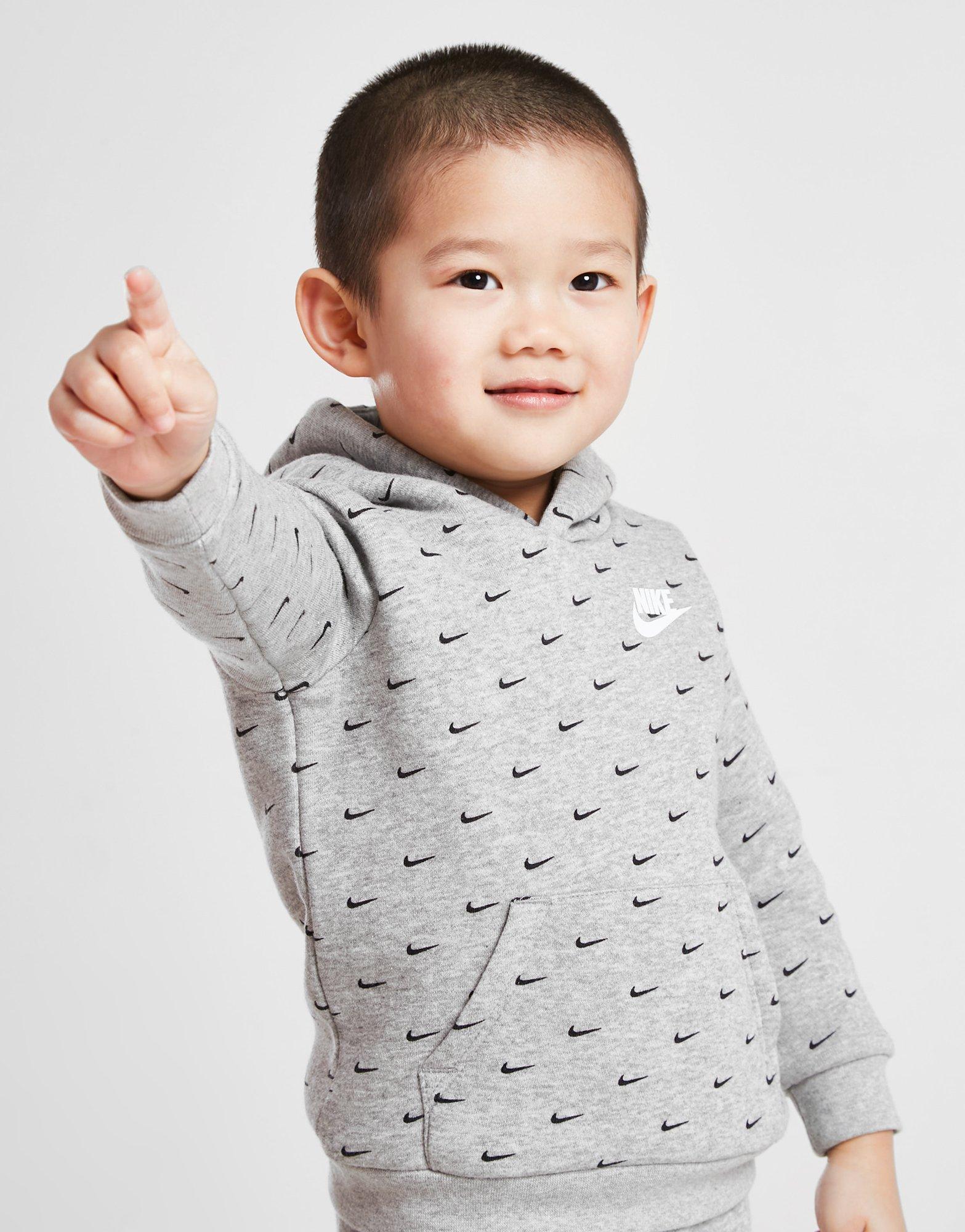 Trening pentru copii NIKE TRENING ALL OVER PRINT SWOOSH OVERHEAD TRACKS 56I434042 Gri