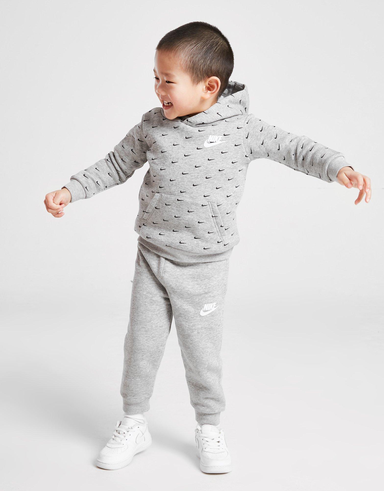 Trening pentru copii NIKE TRENING ALL OVER PRINT SWOOSH OVERHEAD TRACKS 56I434042 Gri