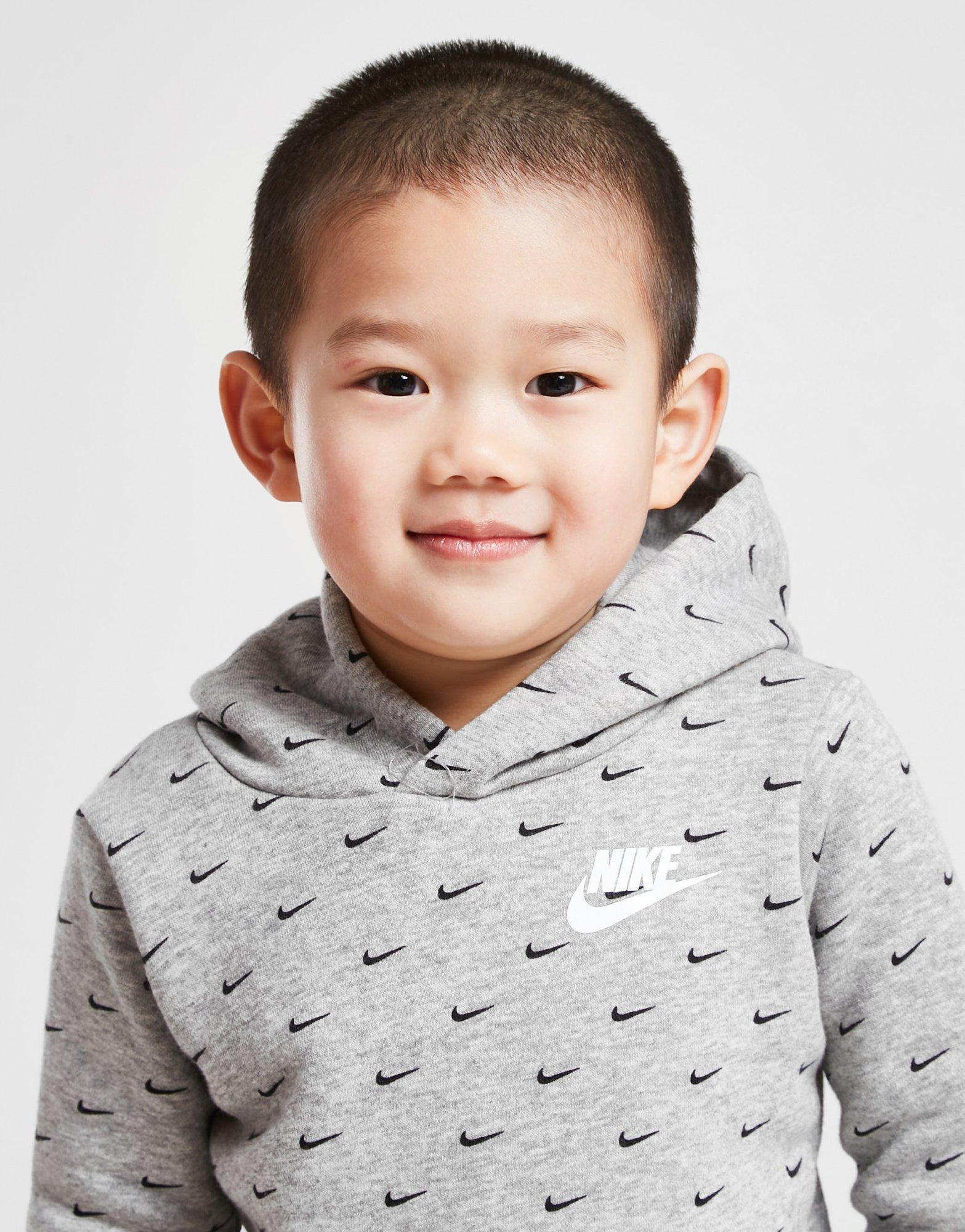 Trening pentru copii NIKE TRENING ALL OVER PRINT SWOOSH OVERHEAD TRACKS 56I434042 Gri