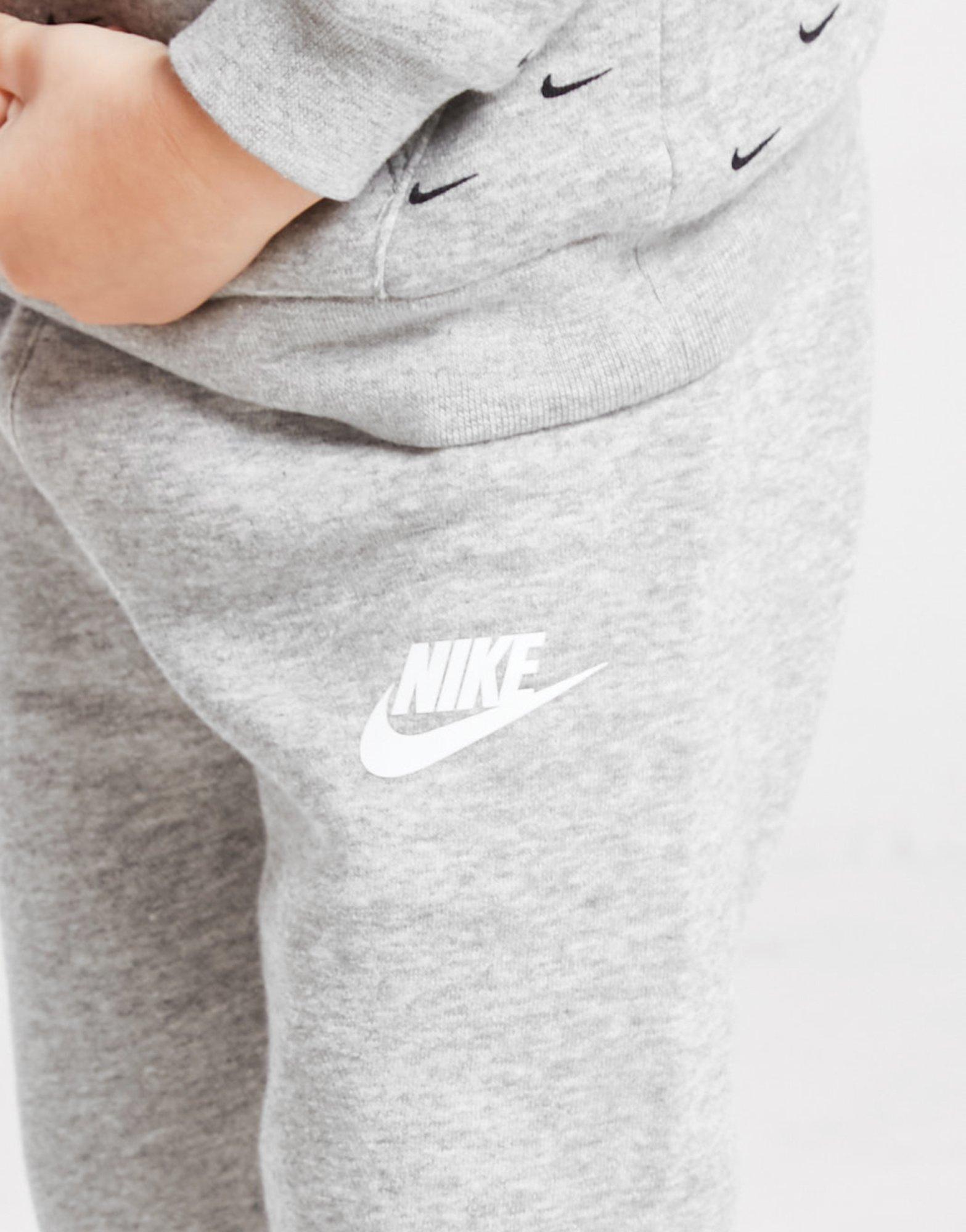 Trening pentru copii NIKE TRENING ALL OVER PRINT SWOOSH OVERHEAD TRACKS 56I434042 Gri