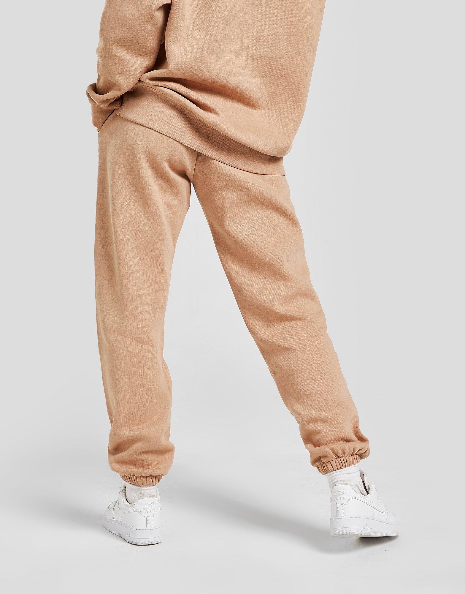 Dámske nohavice NIKE NOHAVICE  SPORTSWEAR ESSENTIAL FLEECE JOGGERS BV4089-200 Hnedá