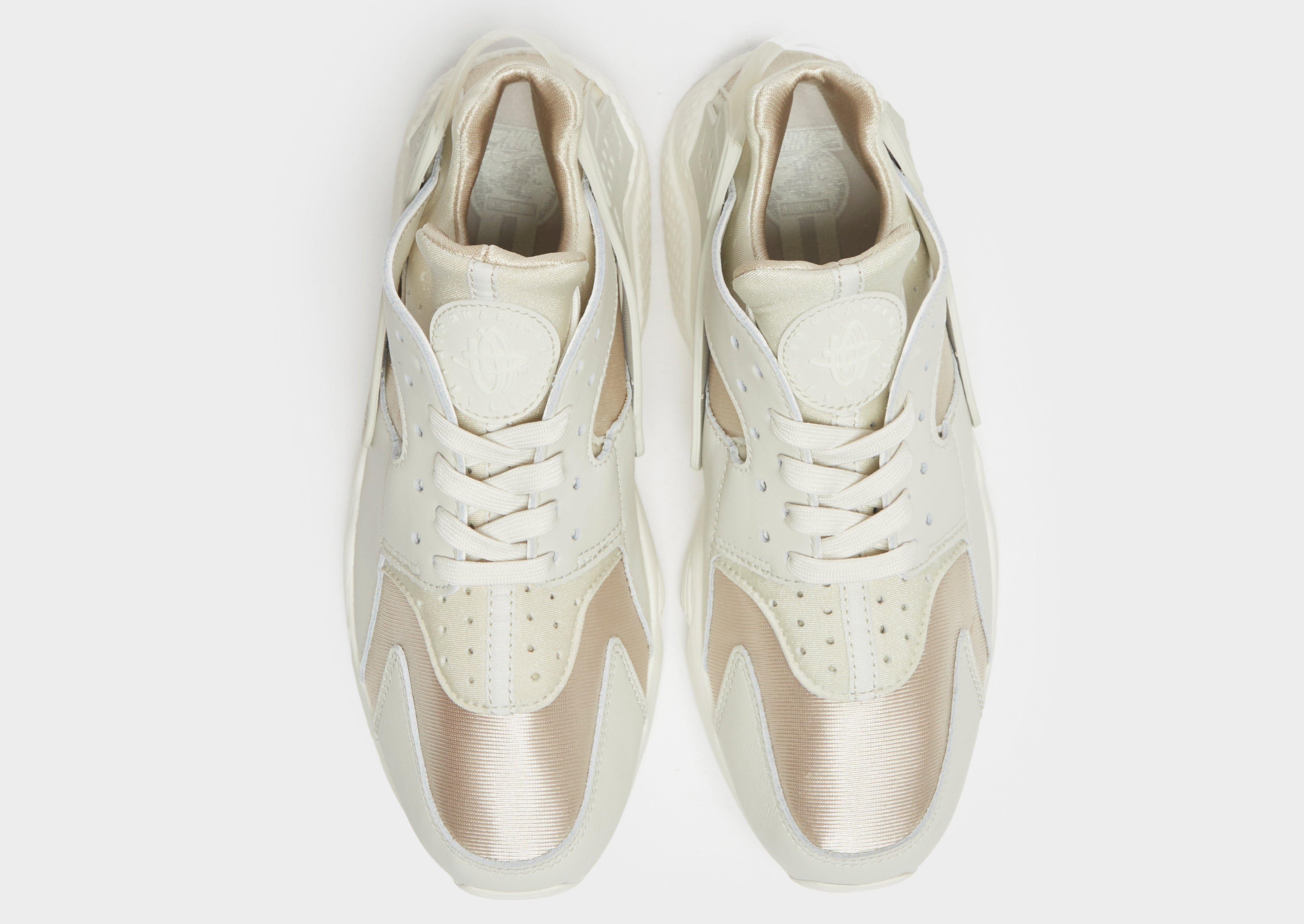 Dámske tenisky NIKE AIR HUARACHE  DQ0916001 Sivá