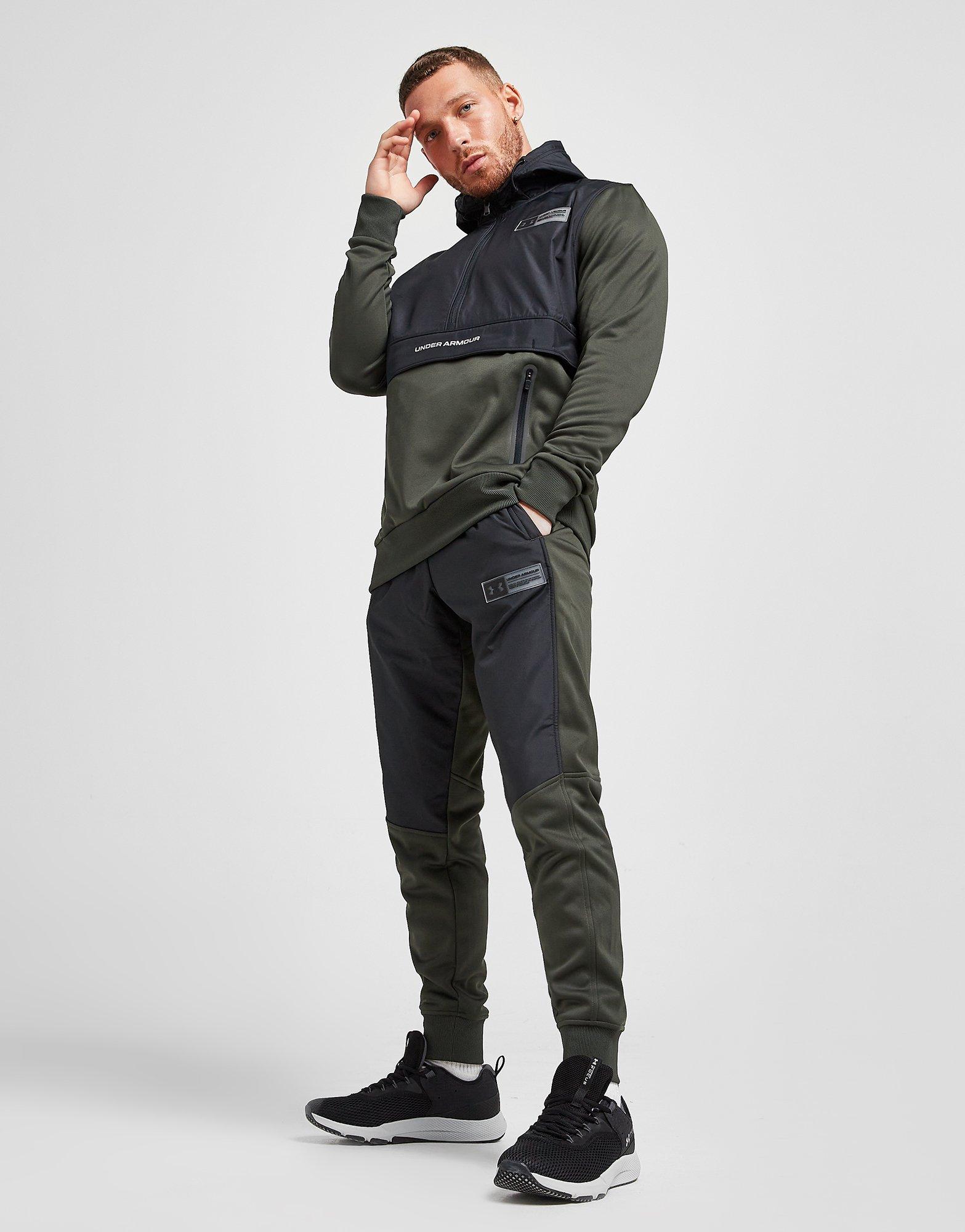 Pánske nohavice UNDER ARMOUR NOHAVICE  UA ARMOUR FLEECE TRACK PANT 1365569-310 Čierna