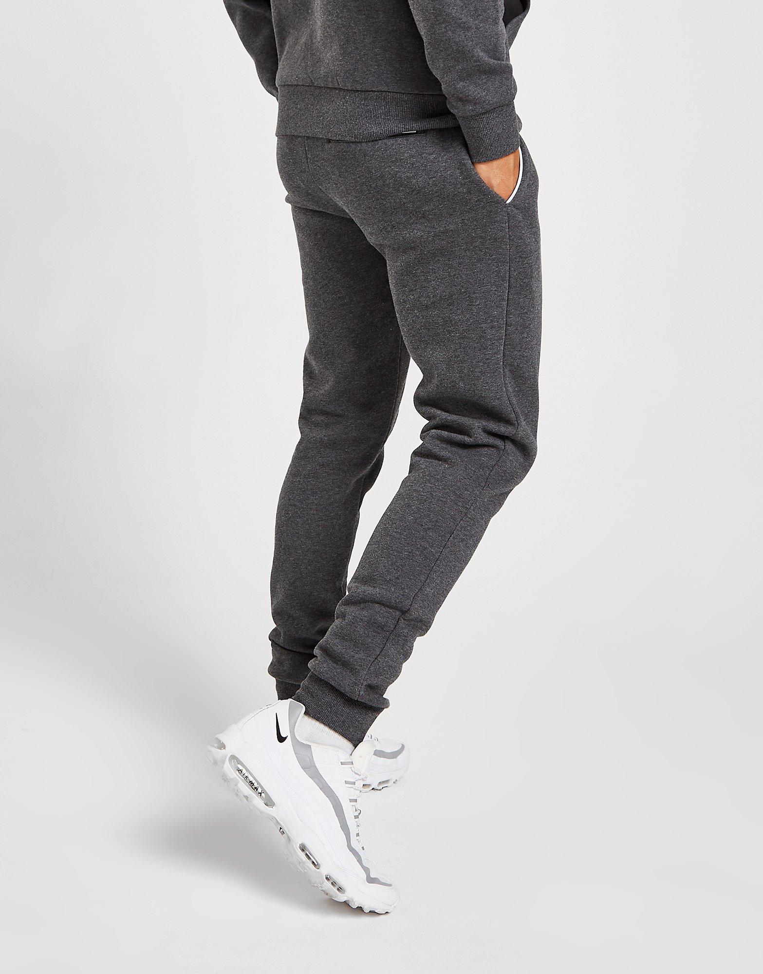 Pantaloni pentru bărbați ELLESSE PANTALONI  PATHER JOGGERS SJD15408 Gri