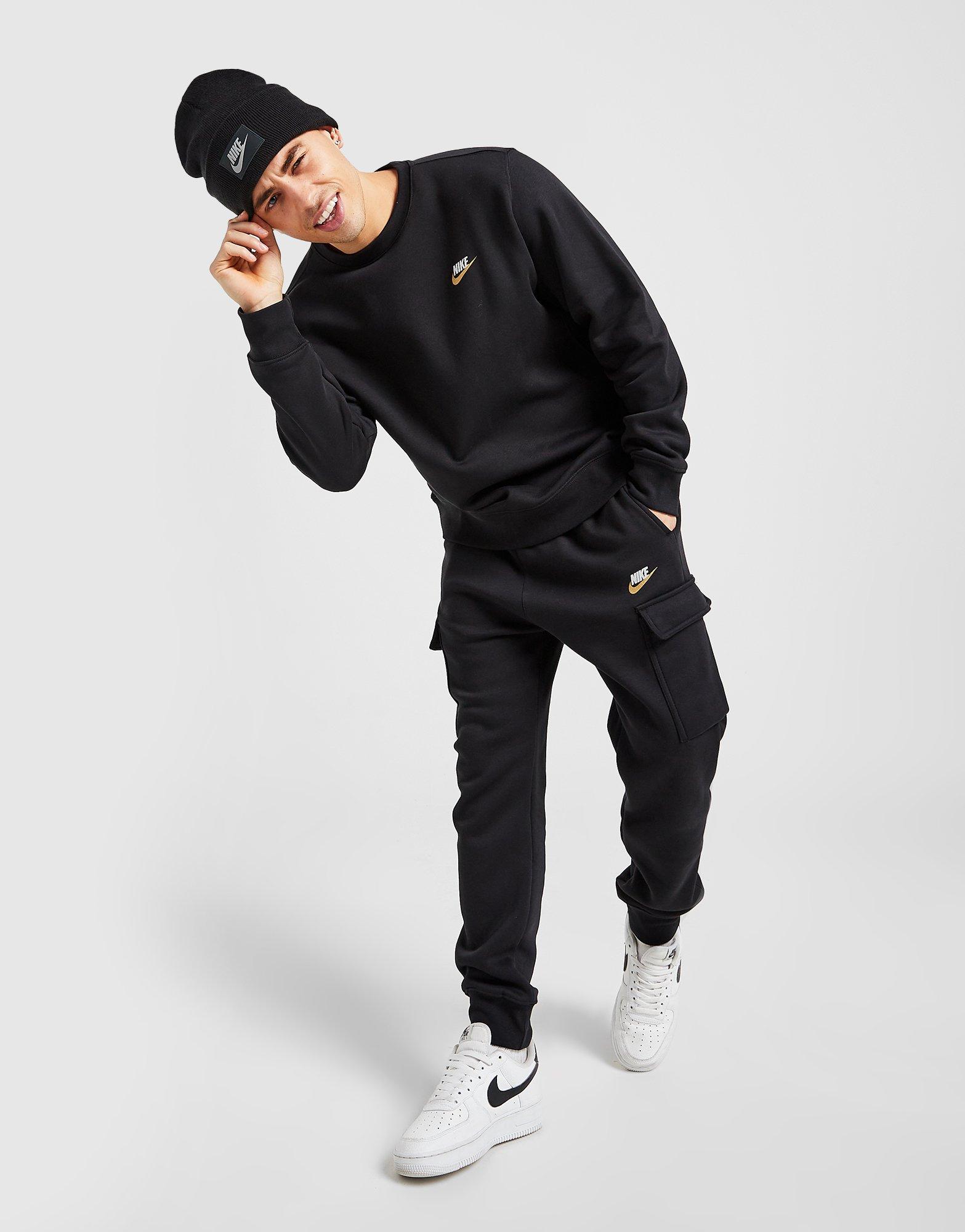 Pantaloni pentru bărbați NIKE PANTALONI  FOUNDATION CARGO JOGGERS DR9280010 Negru