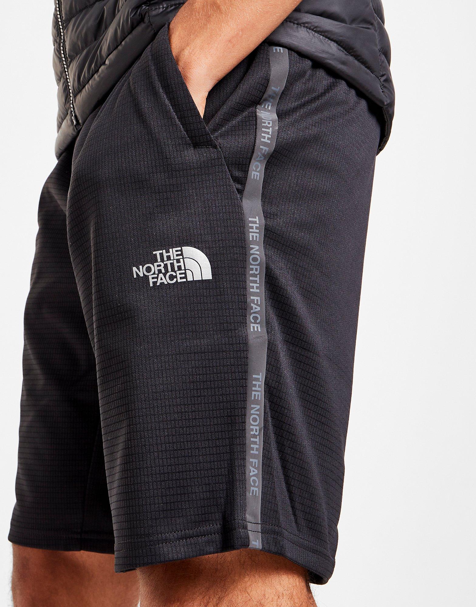 Pánské kraťasy THE NORTH FACE TAPE LOGO SHORTS  NF0A7ST4JK31 Černá