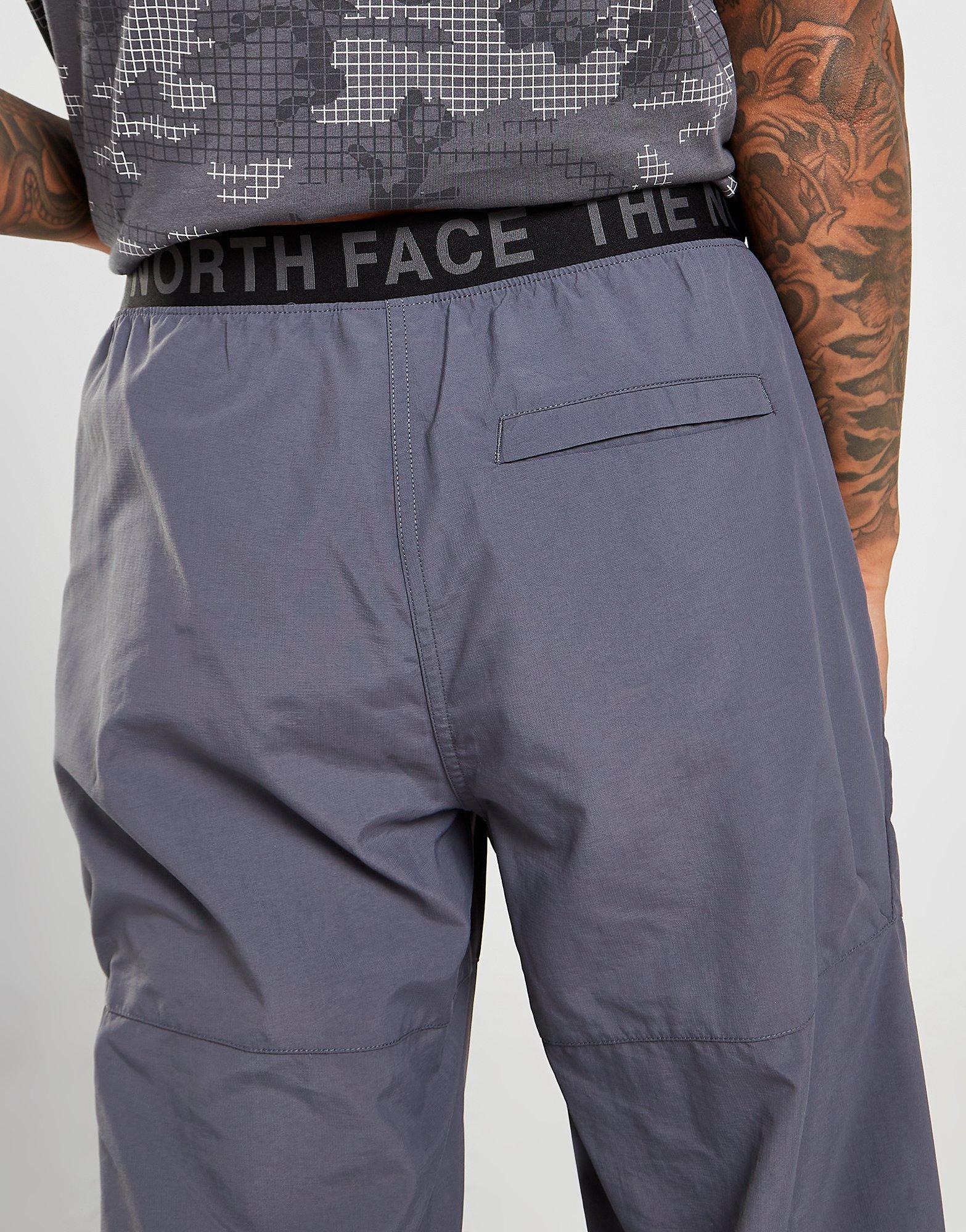 THE NORTH FACE SPODNIE ZIP POCKET PANTS NF0A3XX7PX21 Szary