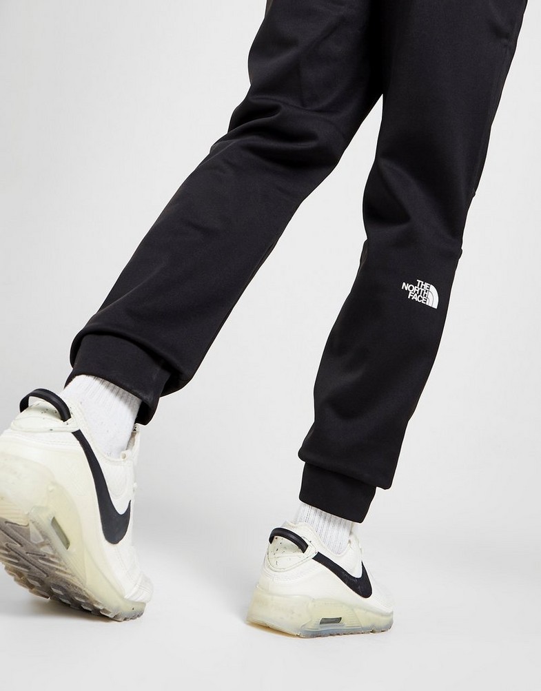 Pantaloni pentru bărbați THE NORTH FACE PANTALONI DE   TRENING  MITTELLEGI JOGGERS  NF0A55CMKY41 Negru
