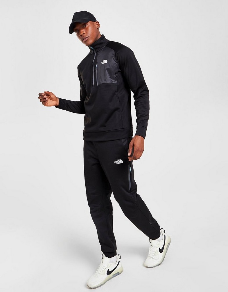 Pantaloni pentru bărbați THE NORTH FACE PANTALONI DE   TRENING  MITTELLEGI JOGGERS  NF0A55CMKY41 Negru