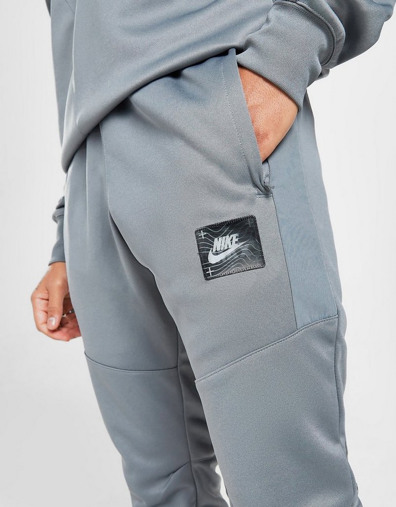 Pantaloni pentru bărbați NIKE AIR MAX SPORTSWEAR TRACK PANTS  DO7235-065 Gri