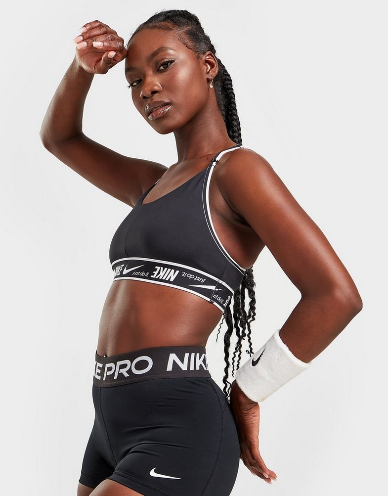 Női sportmelltartók NIKE TRAINING INDY TAPE SPORTS BRA  DM0560-010 Fekete