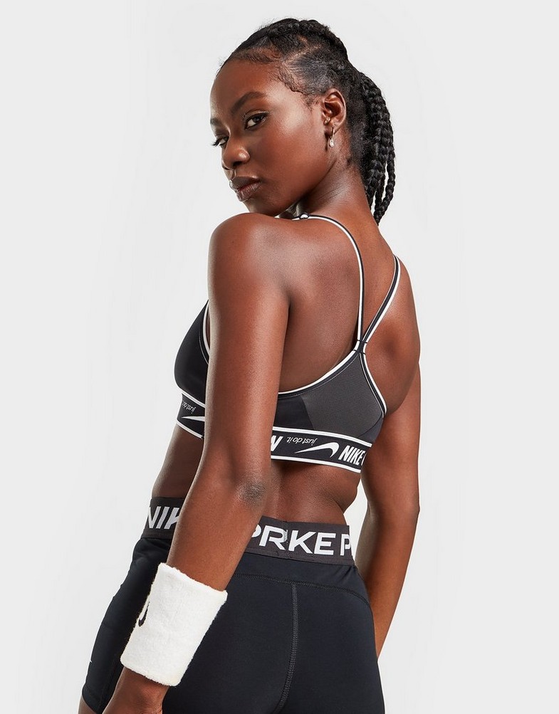 Női sportmelltartók NIKE TRAINING INDY TAPE SPORTS BRA  DM0560-010 Fekete