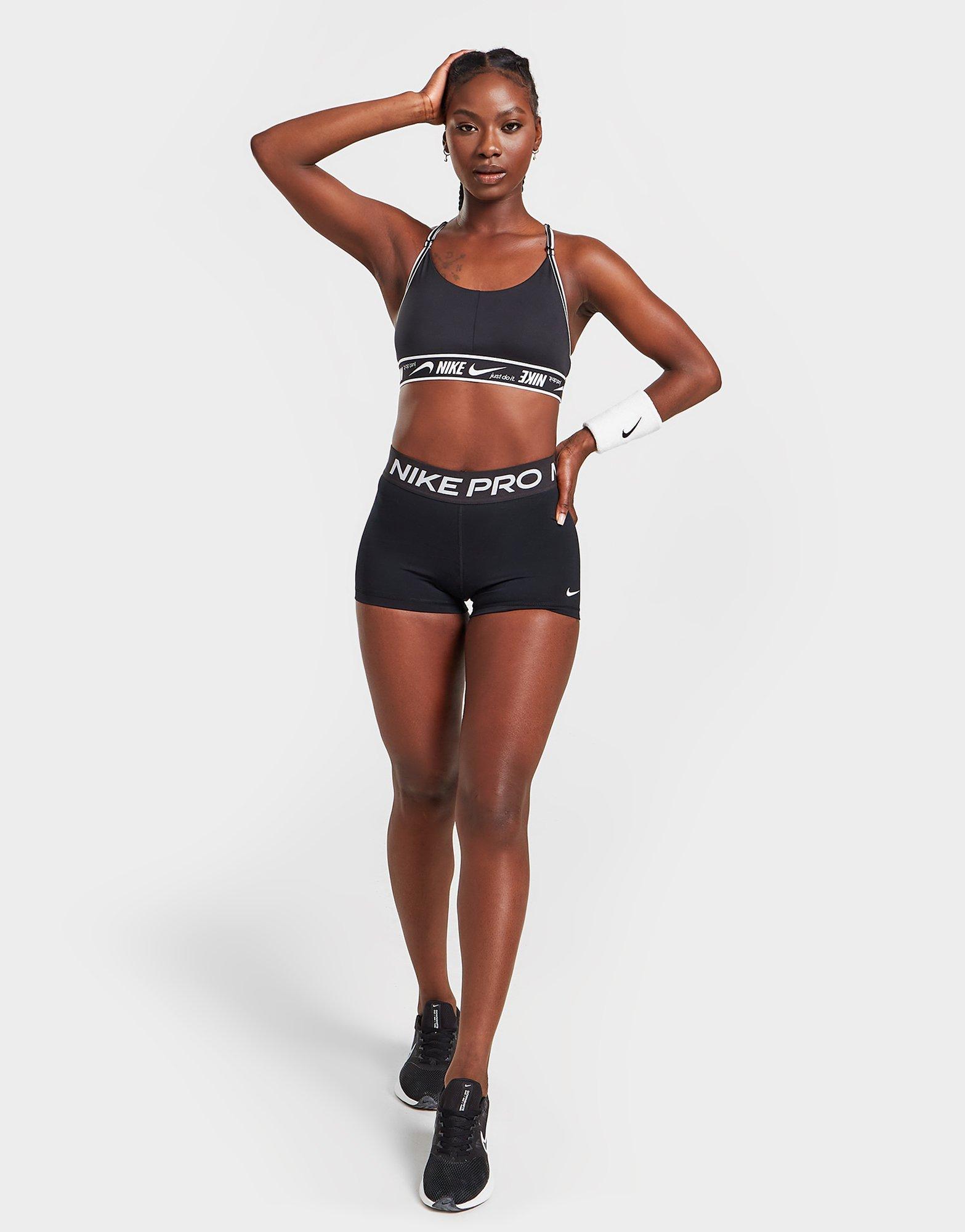 Dámska športová podprsenka NIKE TRAINING INDY TAPE SPORTS BRA  DM0560-010 Čierna
