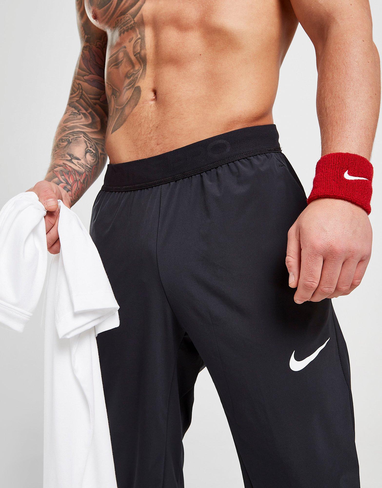 Pánske nohavice NIKE PRO DRI FIT VENT MAX TRACK PANTS DM5948011 Čierna