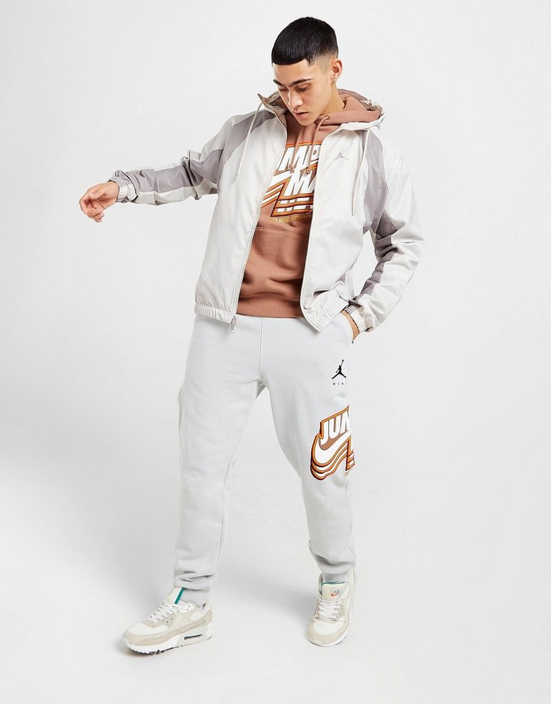 NIKE PRZEJŚCIOWA ESSENTIAL WOVEN JACKET DJ9828-104 | kolor Beżowy
