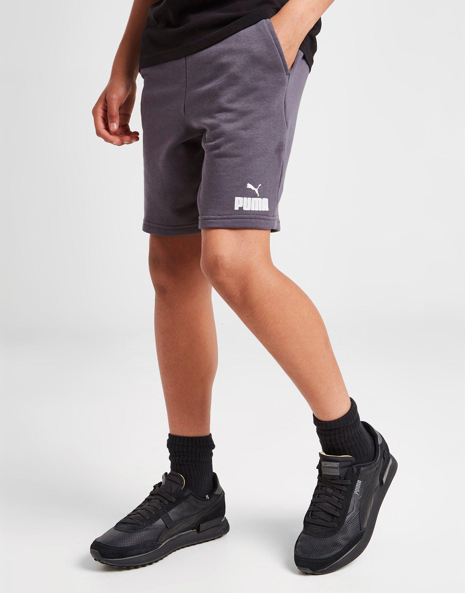Detské krátke nohavice PUMA CORE LOGO SHORTS JUNIOR  67118417 Sivá