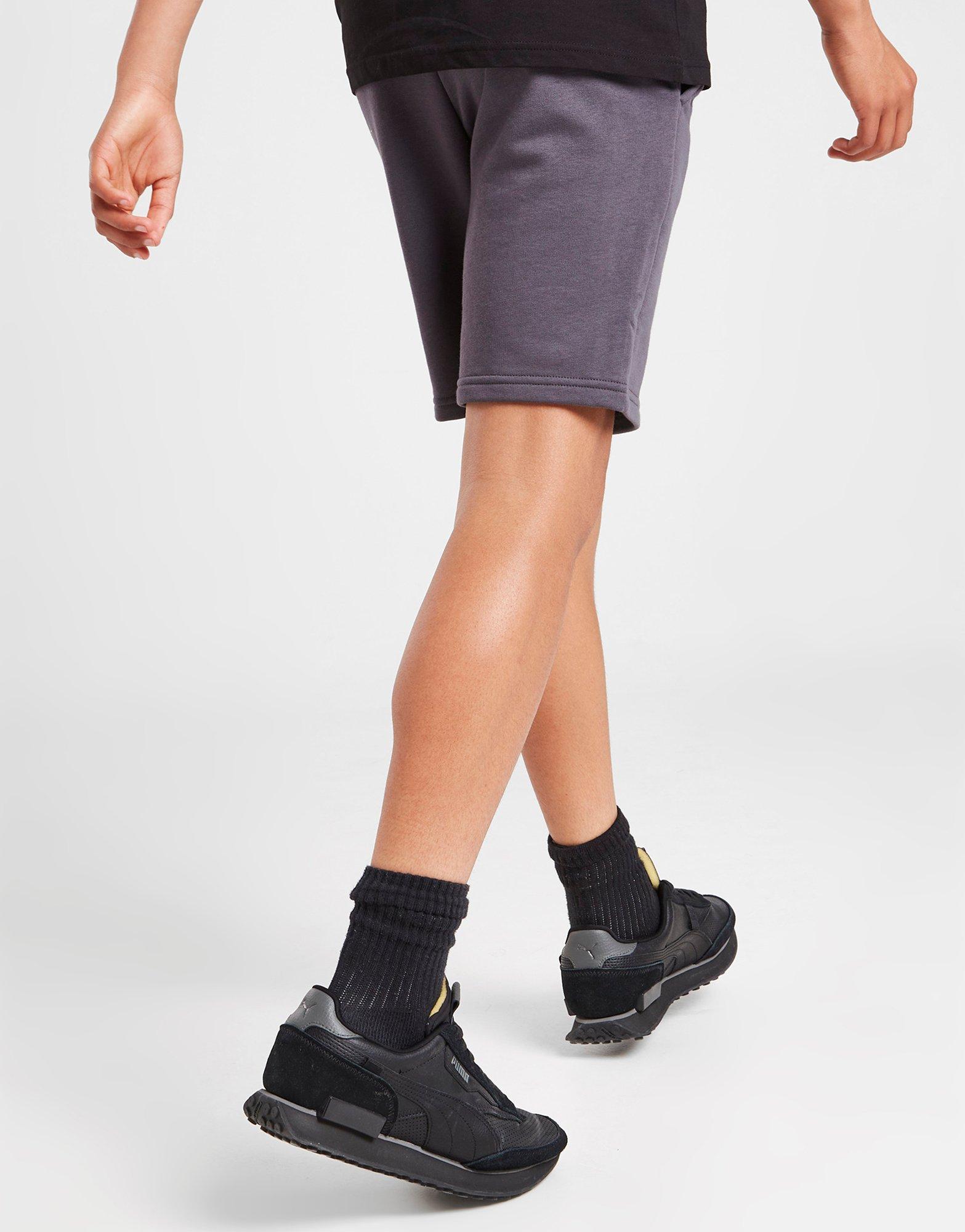 Detské krátke nohavice PUMA CORE LOGO SHORTS JUNIOR  67118417 Sivá