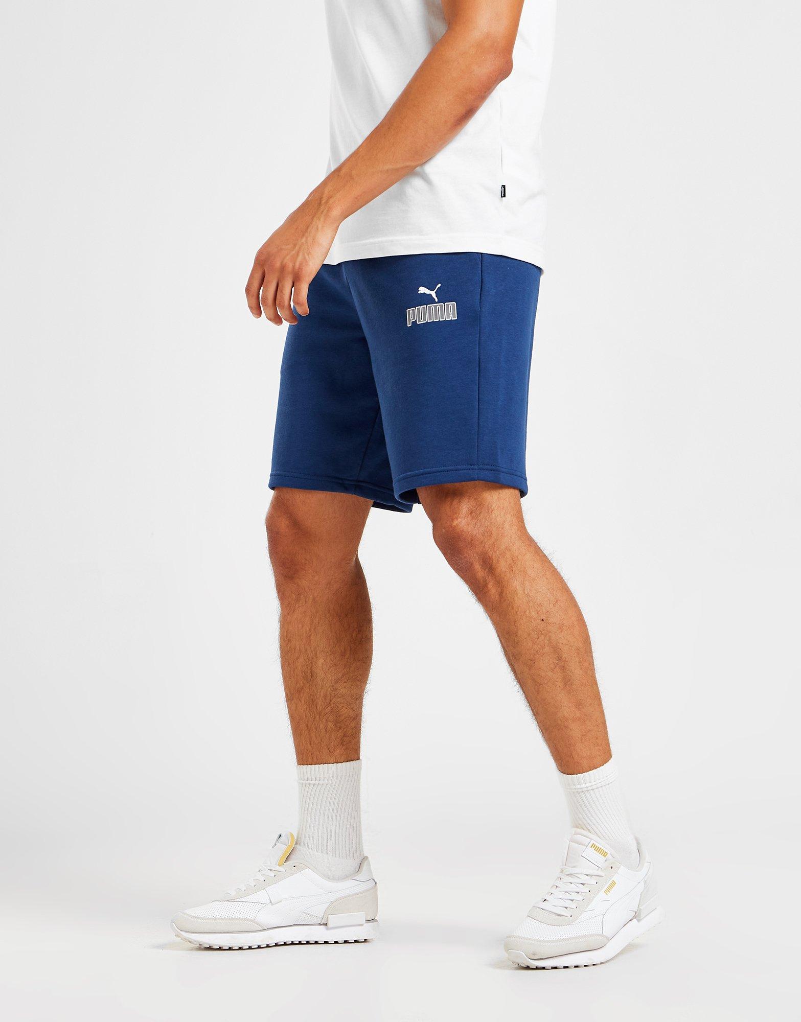 Pánske šortky PUMA NEW LOGO SHORTS  67199345 Modrá