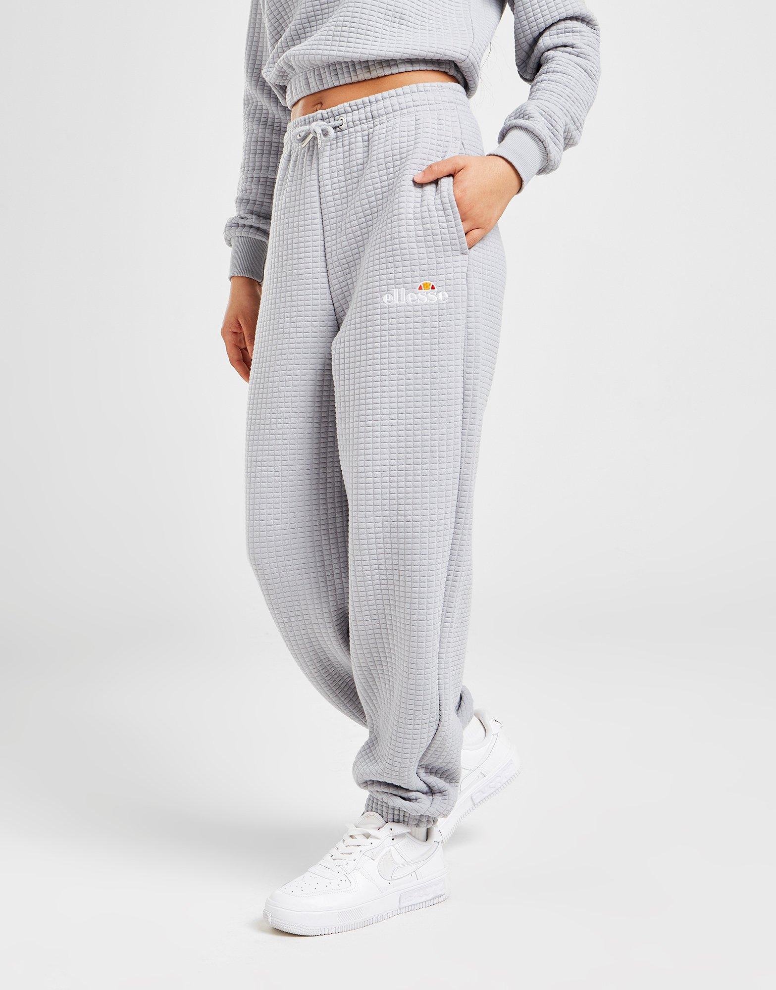 Dámske nohavice ELLESSE NOHAVICE  WAFFLE JOGGERS SJD13767GRY Sivá