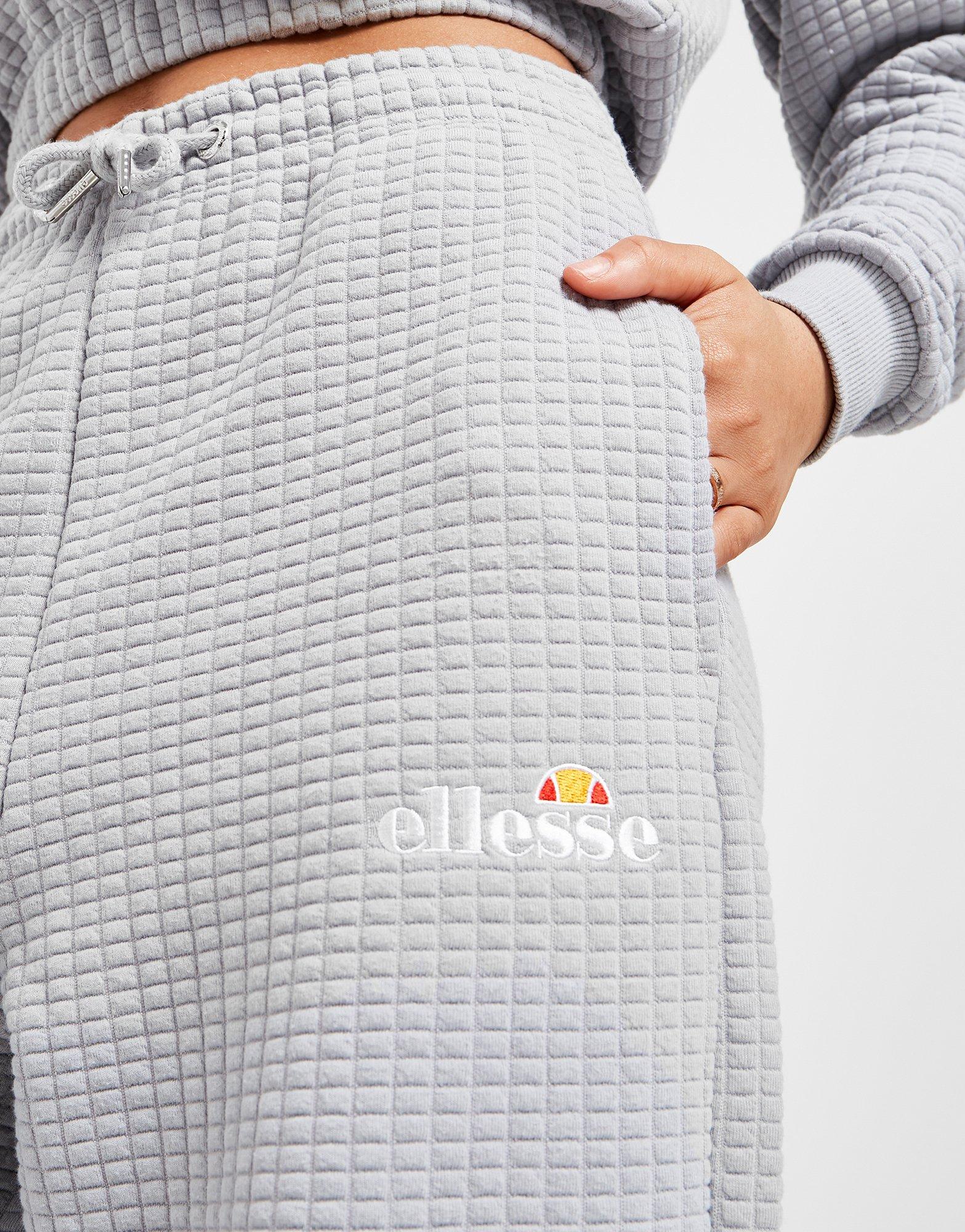 Dámske nohavice ELLESSE NOHAVICE  WAFFLE JOGGERS SJD13767GRY Sivá