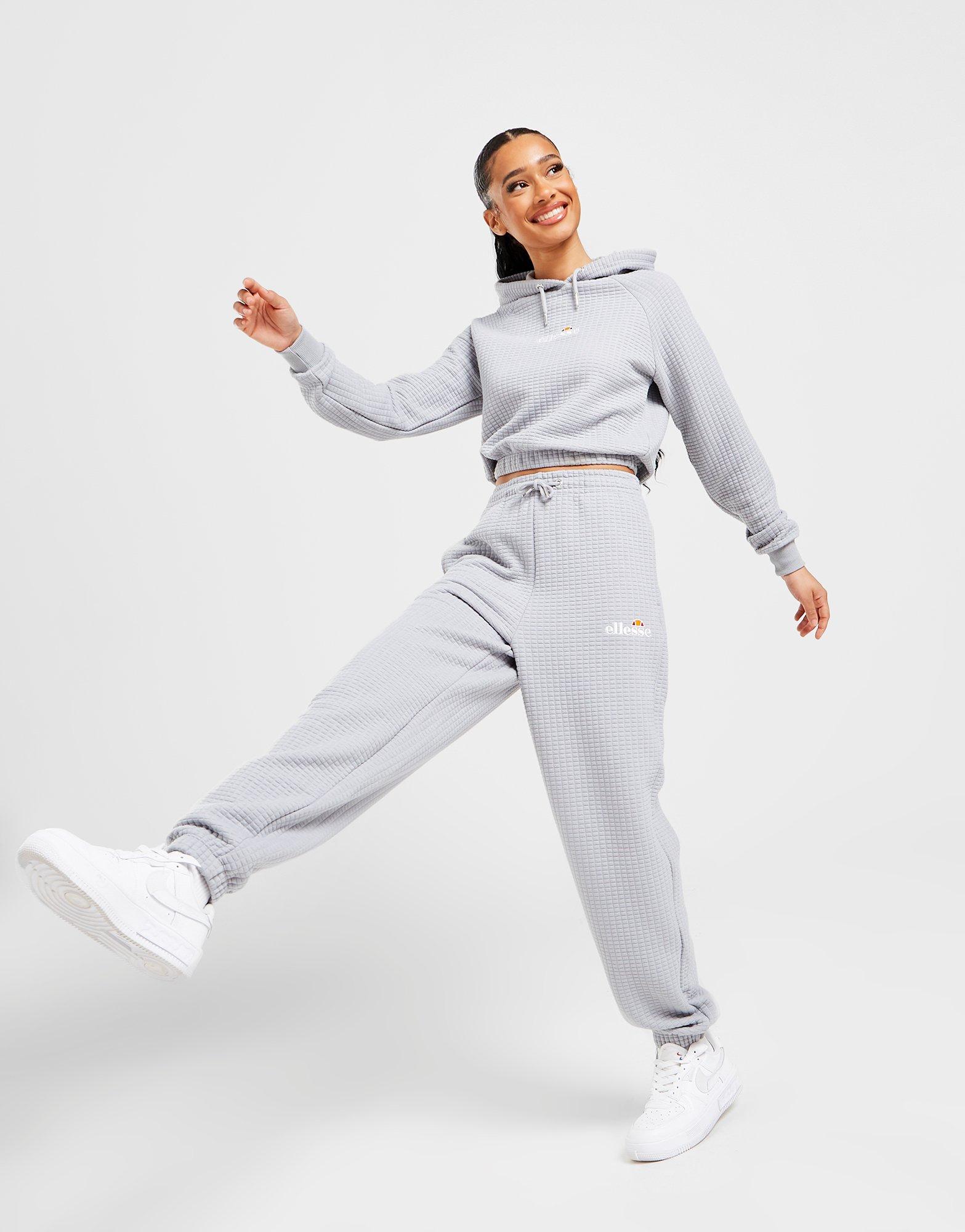 Dámske nohavice ELLESSE NOHAVICE  WAFFLE JOGGERS SJD13767GRY Sivá