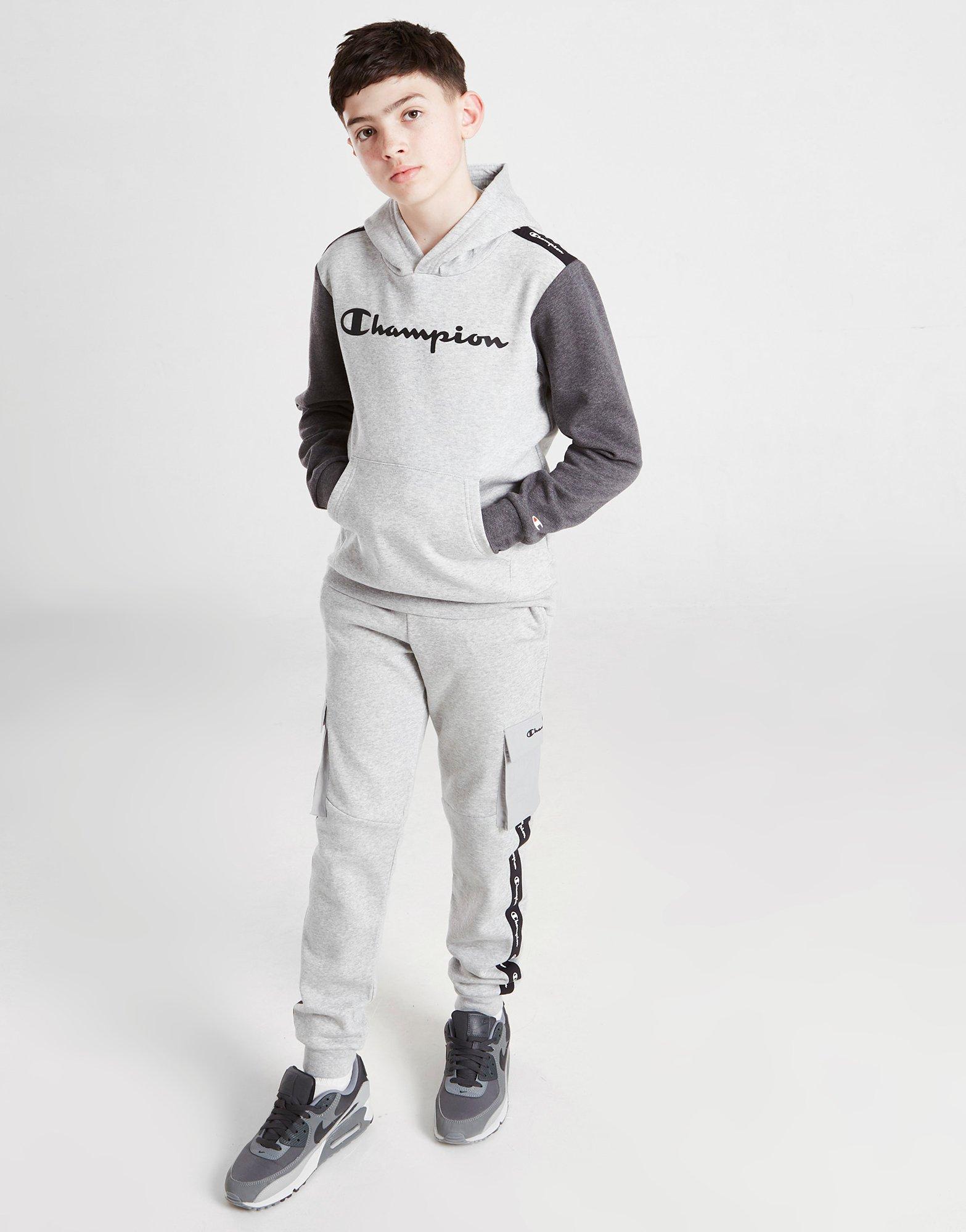 Detská mikina CHAMPION COLOUR BLOCK TAPE OVERHEAD HOODIE JUNIOR  306268EM006 Sivá