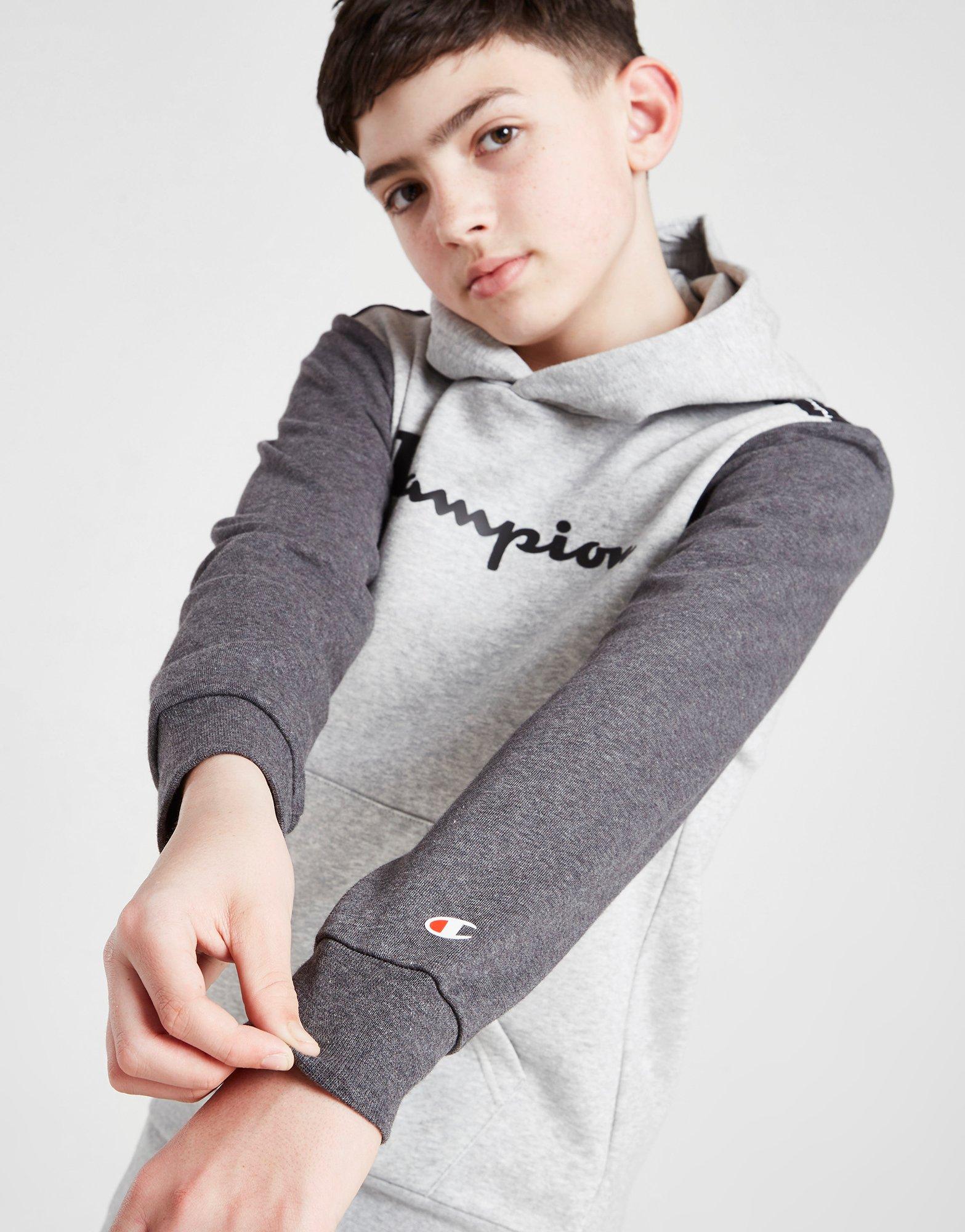 Detská mikina CHAMPION COLOUR BLOCK TAPE OVERHEAD HOODIE JUNIOR  306268EM006 Sivá