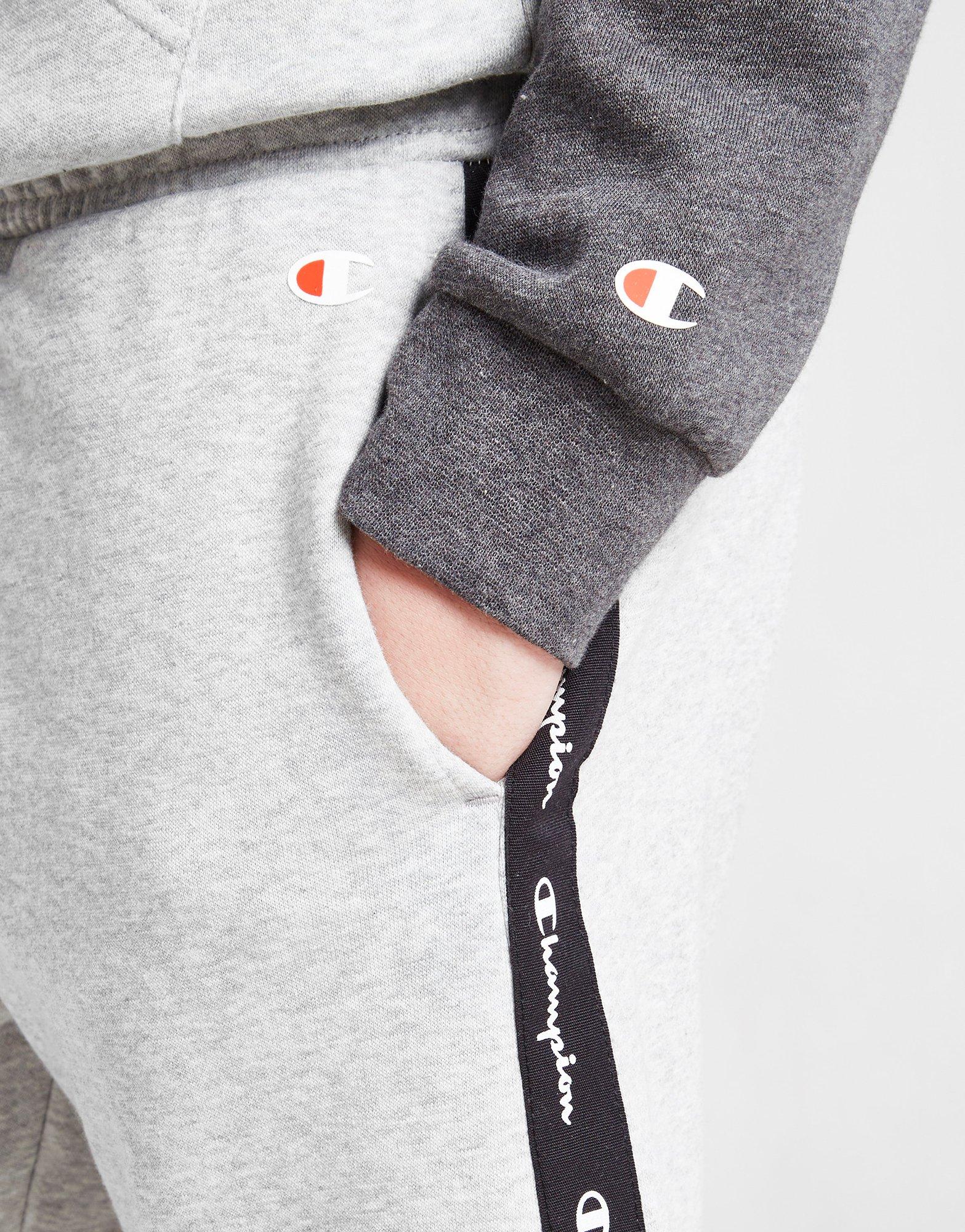 Detské krátke nohavice CHAMPION ŠORTKY  TAPE SHORTS JUNIOR 306271EM006 Sivá