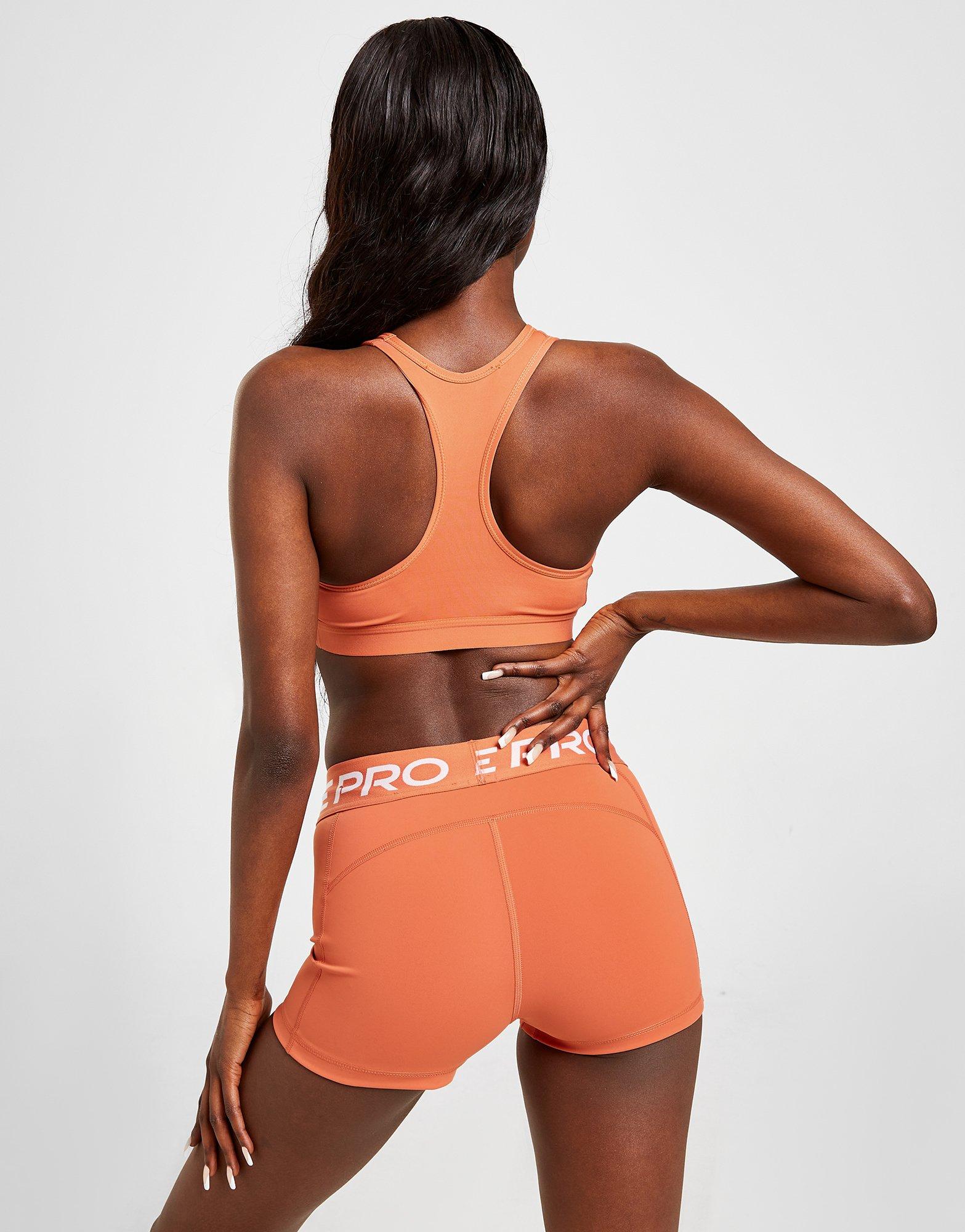 Moteriška sportinė liemenėlė NIKE TRAINING SPORTS BRA  BV3900-827 Ruda