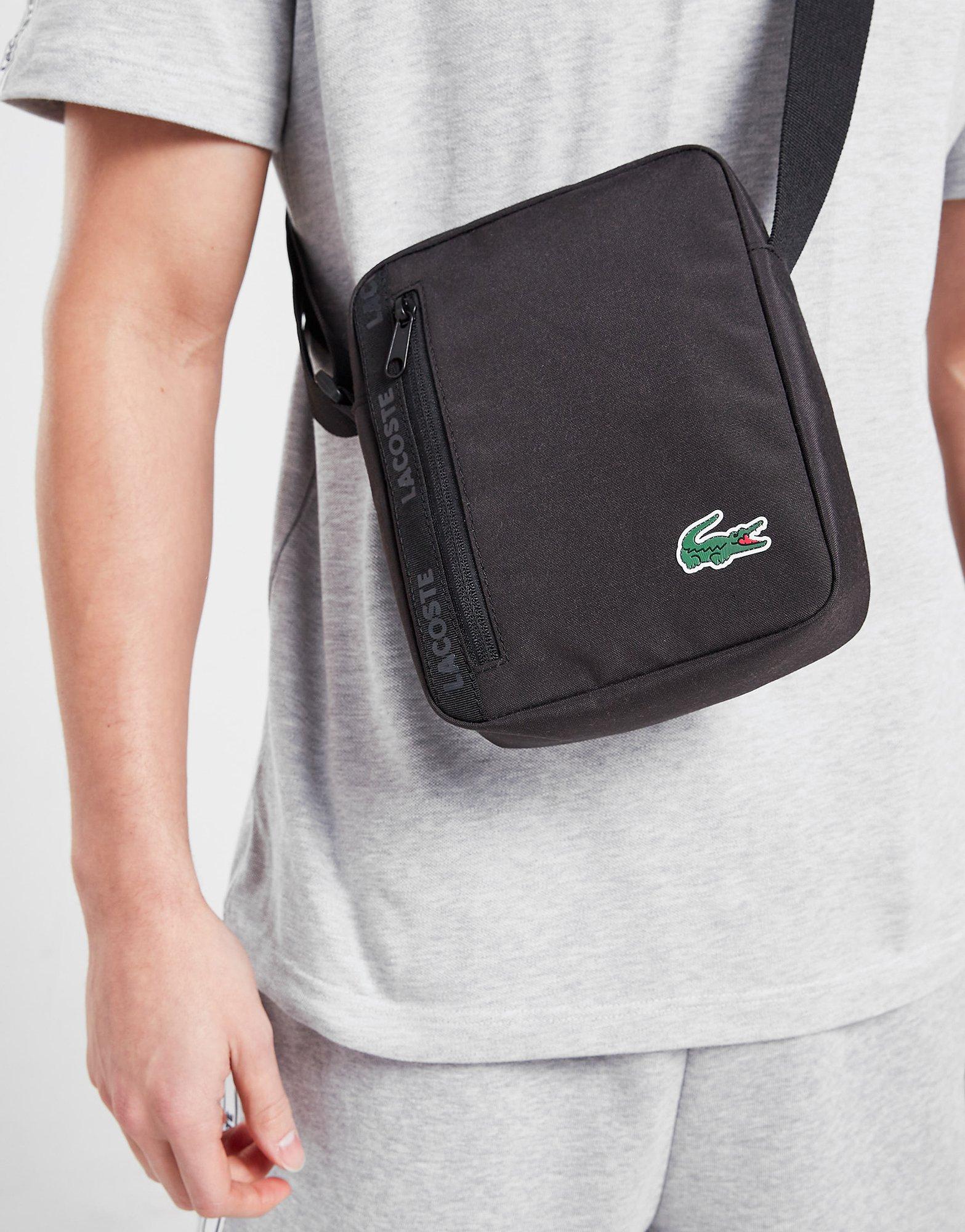 Dámska taška LACOSTE TAPE SHOULDER BAG  NH3872UG Čierna