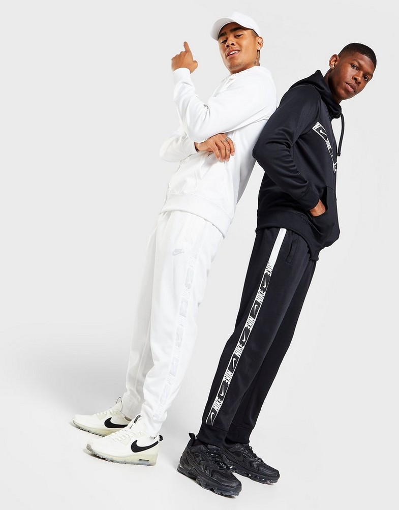 NIKE REPEAT POLYKNIT TRACK PANTS  DM4673-101 Biały