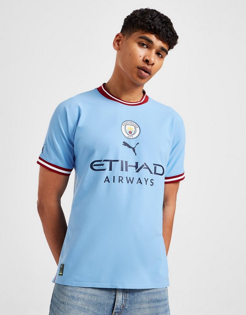 Koszulka, t-shirt męski PUMA KRÓTKI RĘKAW MANCHESTER CITY FC 2022/23 MATCH HOME SHIRT 76570901 Niebieski