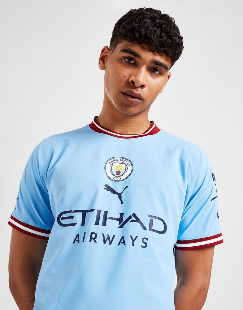 Koszulka, t-shirt męski PUMA KRÓTKI RĘKAW MANCHESTER CITY FC 2022/23 MATCH HOME SHIRT 76570901 Niebieski