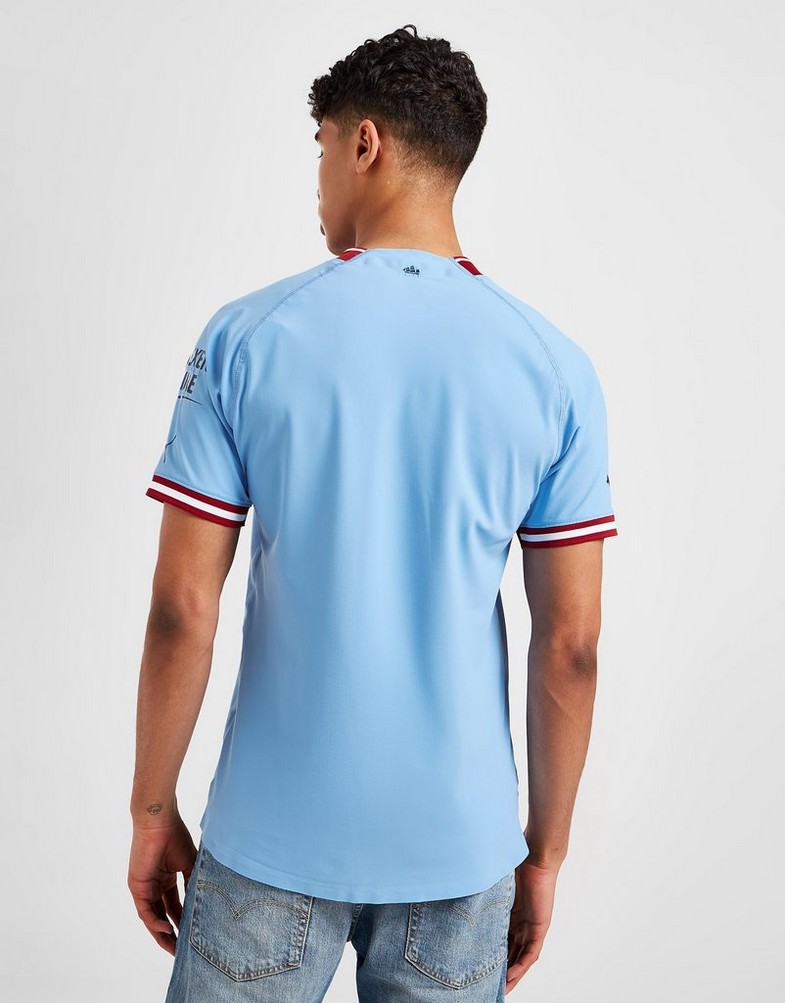 Koszulka, t-shirt męski PUMA KRÓTKI RĘKAW MANCHESTER CITY FC 2022/23 MATCH HOME SHIRT 76570901 Niebieski
