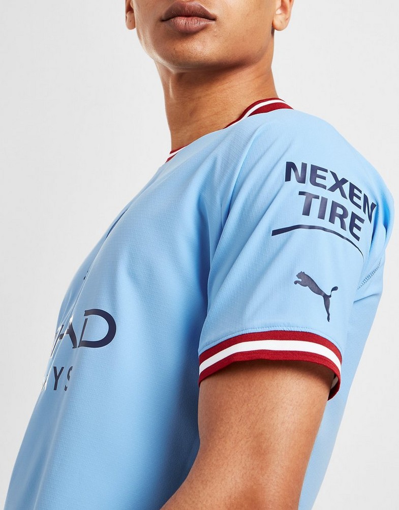 Koszulka, t-shirt męski PUMA KRÓTKI RĘKAW MANCHESTER CITY FC 2022/23 MATCH HOME SHIRT 76570901 Niebieski