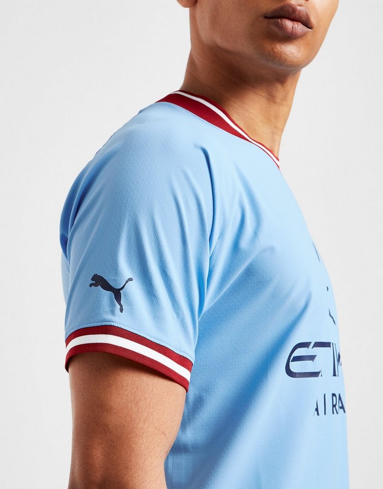 Koszulka, t-shirt męski PUMA KRÓTKI RĘKAW MANCHESTER CITY FC 2022/23 MATCH HOME SHIRT 76570901 Niebieski