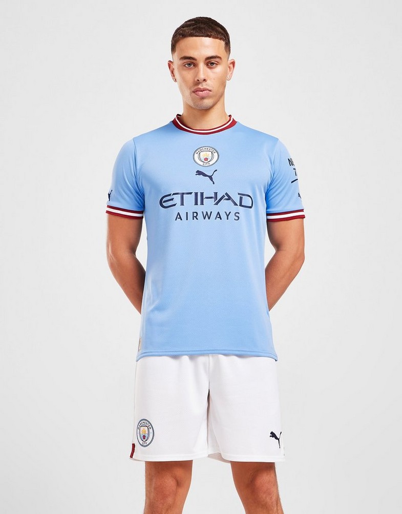 Krótkie spodenki, szorty męskie PUMA SZORTY MANCHESTER CITY FC 2022/23 HOME SHORTS 76575204 Biały