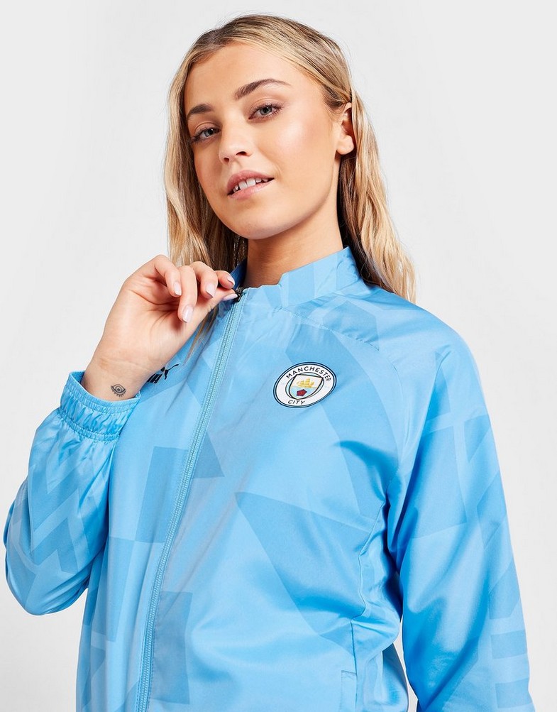 Koszulka, t-shirt męski PUMA KRÓTKI RĘKAW MANCHESTER CITY FC PRE-MATCH JACKET 76778310 Niebieski