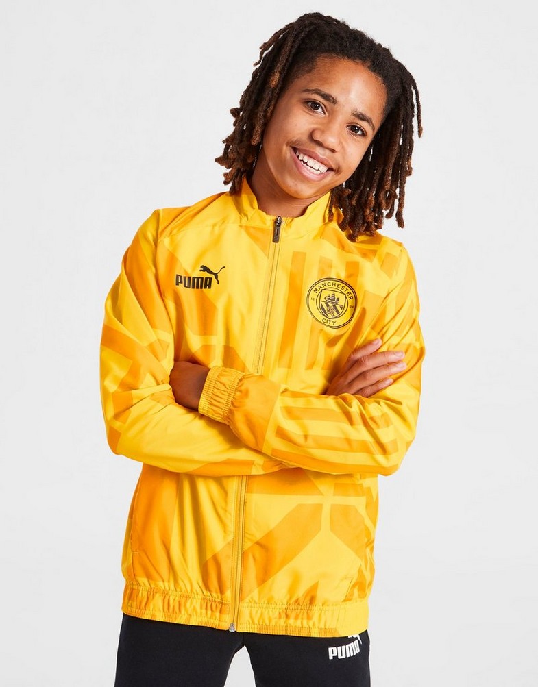 Koszulka, t-shirt dziecięcy PUMA KRÓTKI RĘKAW MANCHESTER CITY FC PRE-MATCH JACKET JUNIOR 76778609 Złoty