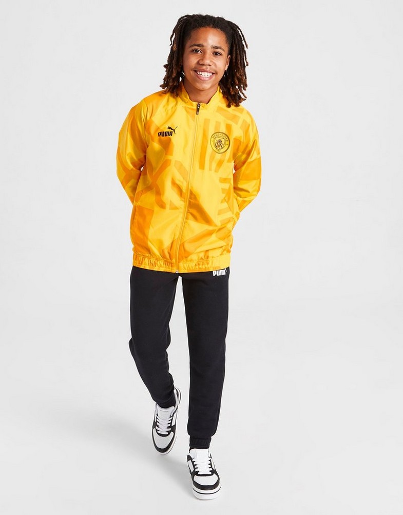 Koszulka, t-shirt dziecięcy PUMA KRÓTKI RĘKAW MANCHESTER CITY FC PRE-MATCH JACKET JUNIOR 76778609 Złoty