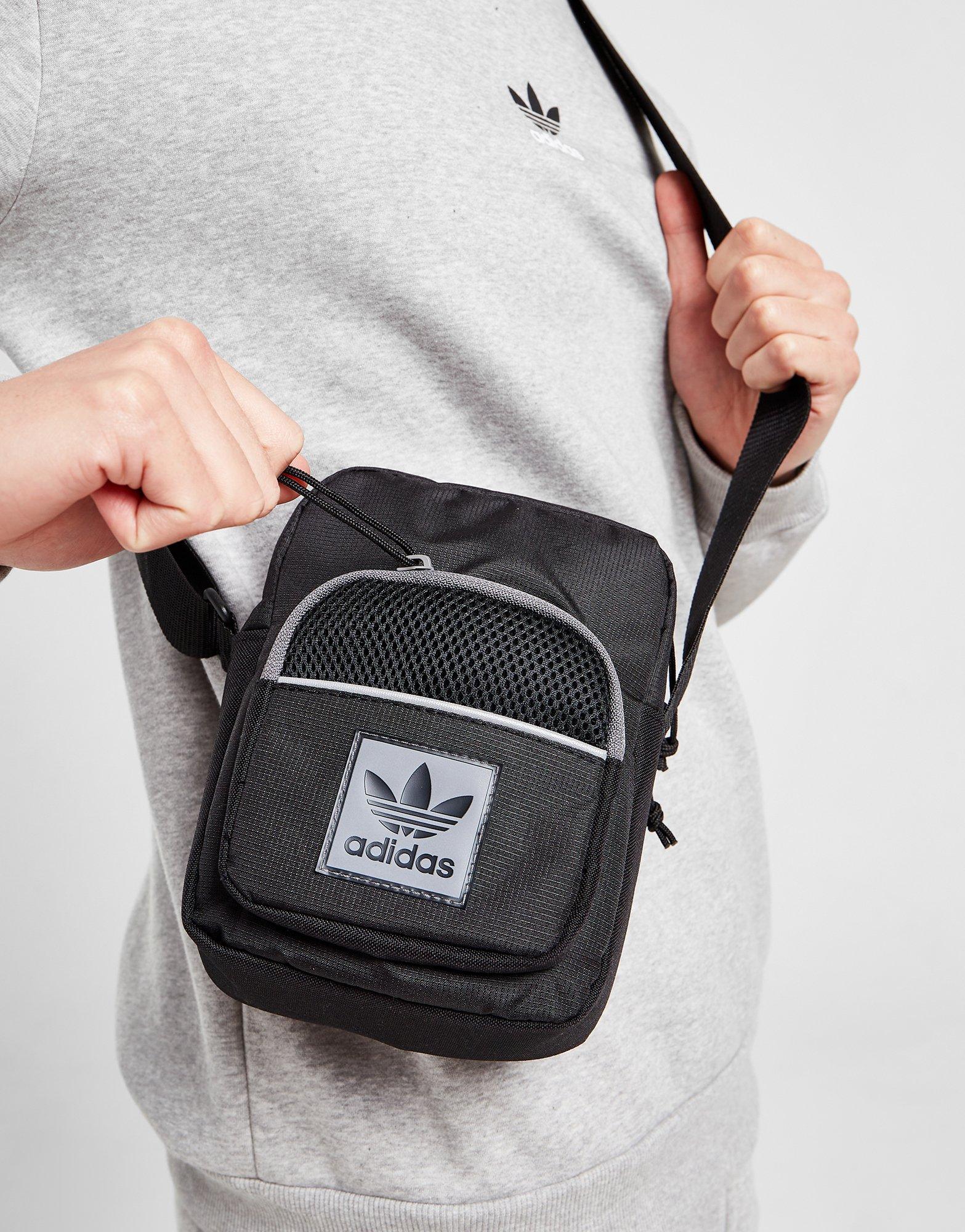 Dámska taška ADIDAS ID96 POUCH BAG  HN7022 Sivá
