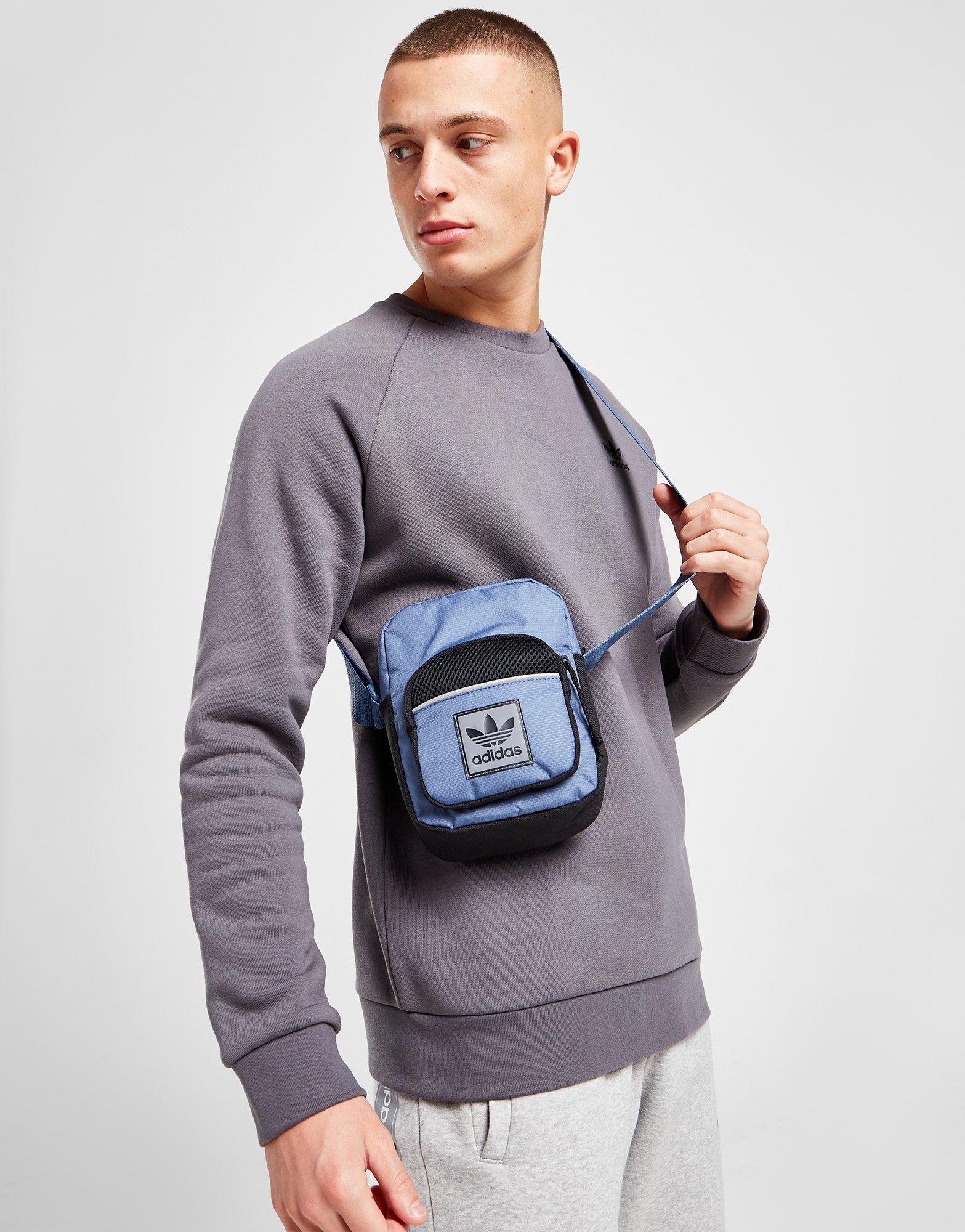 Dámska taška ADIDAS TAŠKA ID96 POUCH BAG HN7023 Tmavomodrá