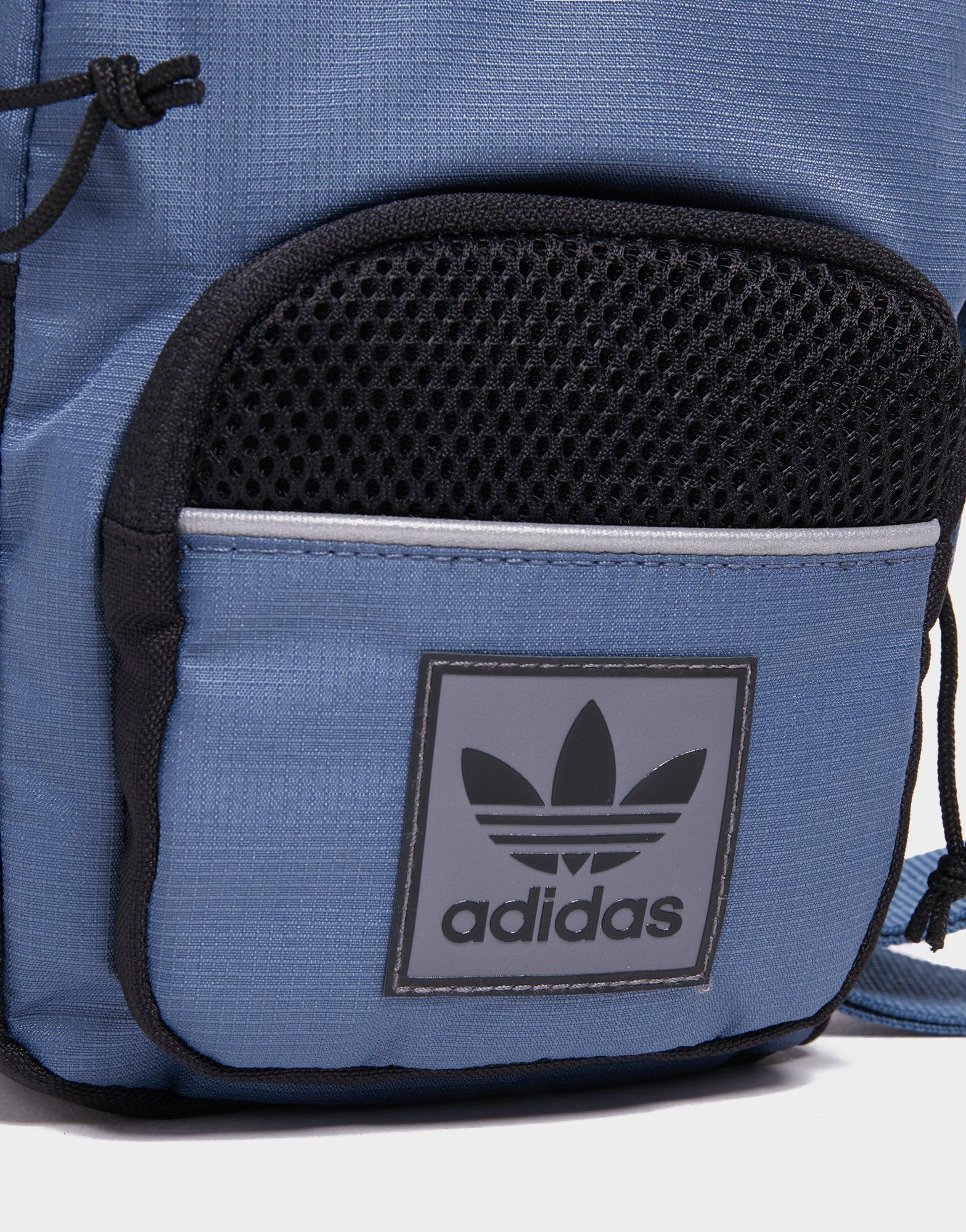 Dámska taška ADIDAS TAŠKA ID96 POUCH BAG HN7023 Tmavomodrá