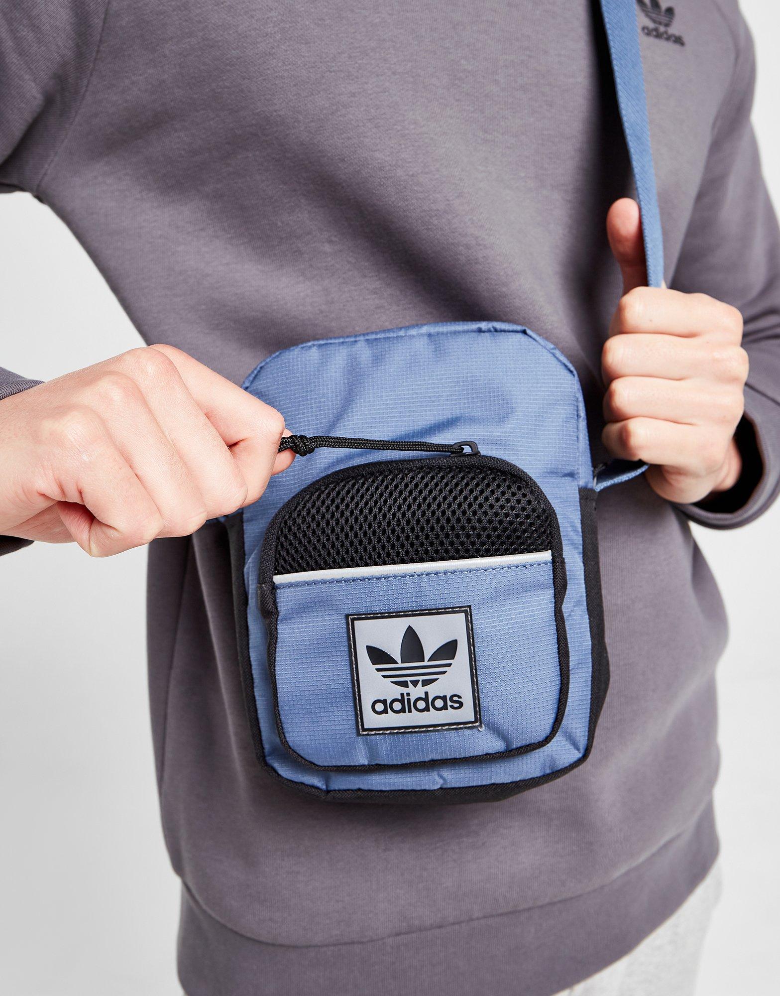 Dámska taška ADIDAS TAŠKA ID96 POUCH BAG HN7023 Tmavomodrá