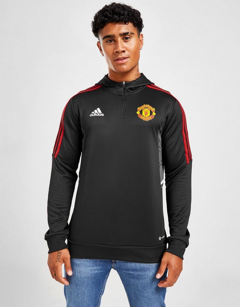 Koszulka, t-shirt męski ADIDAS KRÓTKI RĘKAW MANCHESTER UNITED FC TRACK HOODIE HE5099 Czarny