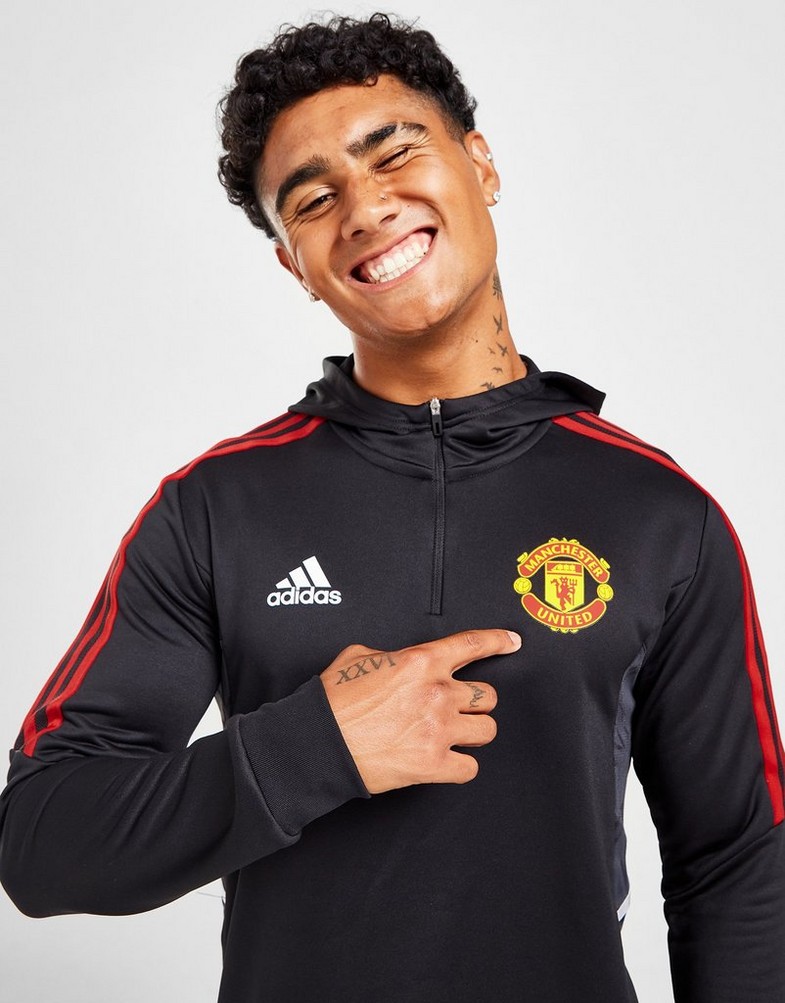 Koszulka, t-shirt męski ADIDAS KRÓTKI RĘKAW MANCHESTER UNITED FC TRACK HOODIE HE5099 Czarny