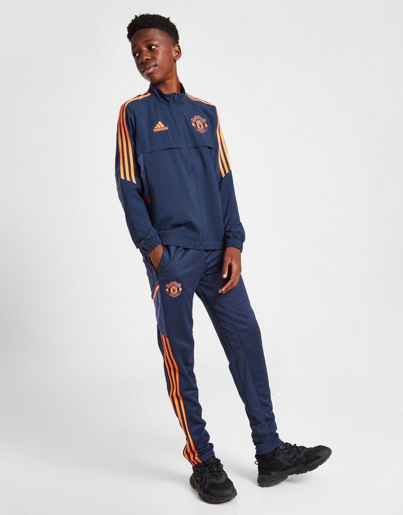 Komplet dresowy dziecięcy ADIDAS DRES MANCHESTER UNITED FC TRAINING TRACK PANTS JUNIOR HH9324 Granatowy