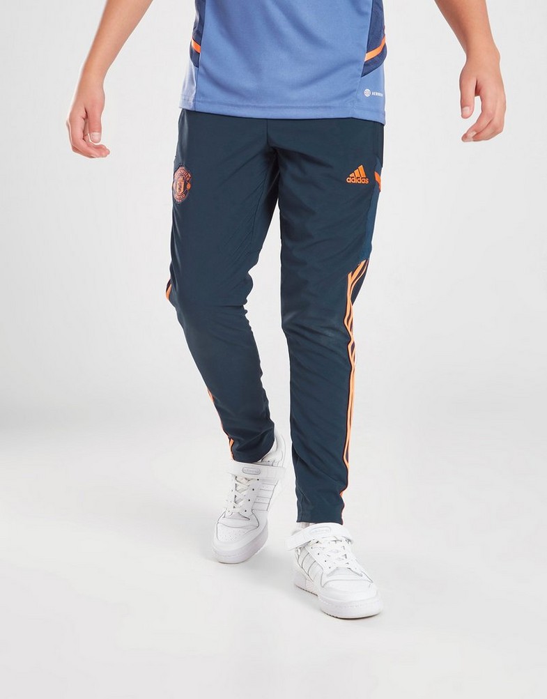 Komplet dresowy dziecięcy ADIDAS DRES MANCHESTER UNITED PRESENTATION TRACK PANTS JUNIOR HH9330 Granatowy