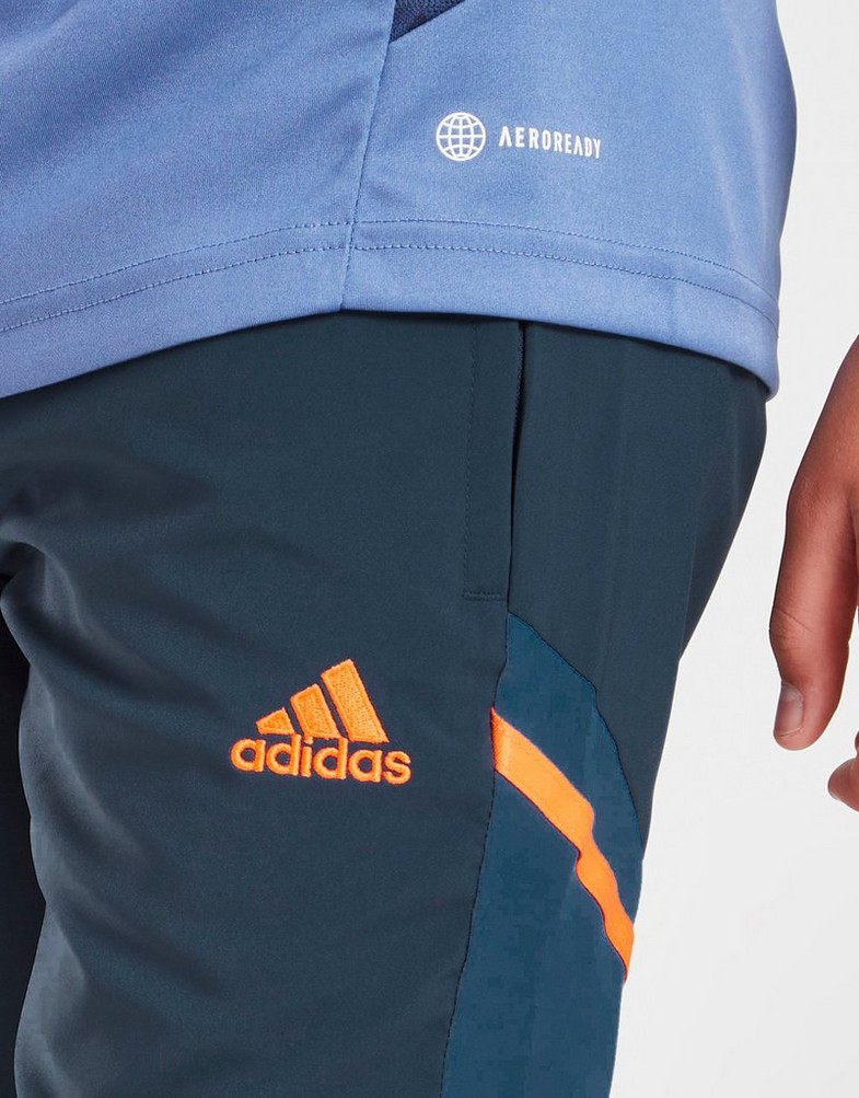 Komplet dresowy dziecięcy ADIDAS DRES MANCHESTER UNITED PRESENTATION TRACK PANTS JUNIOR HH9330 Granatowy